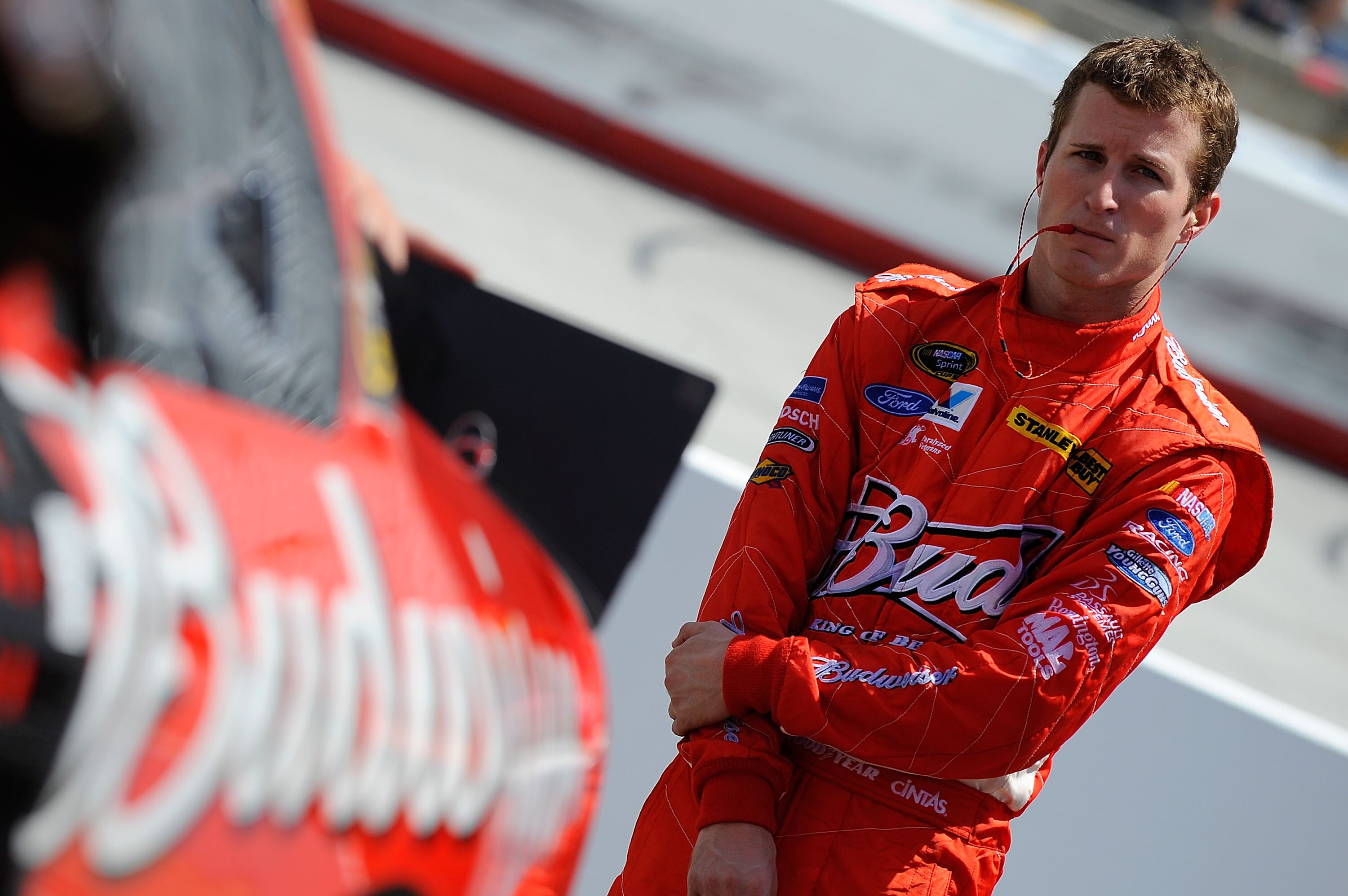 BRISTOL, TN - AUGUST 20:  Kasey Kahne, driver of the #9 Budweiser Ford, stands by his car during practice for the NASCAR Sprint Cup Series IRWIN Tools Night Race at Bristol Motor Speedway on August 20, 2010 in Bristol, Tennessee.  (Photo by Jared C. Tilto