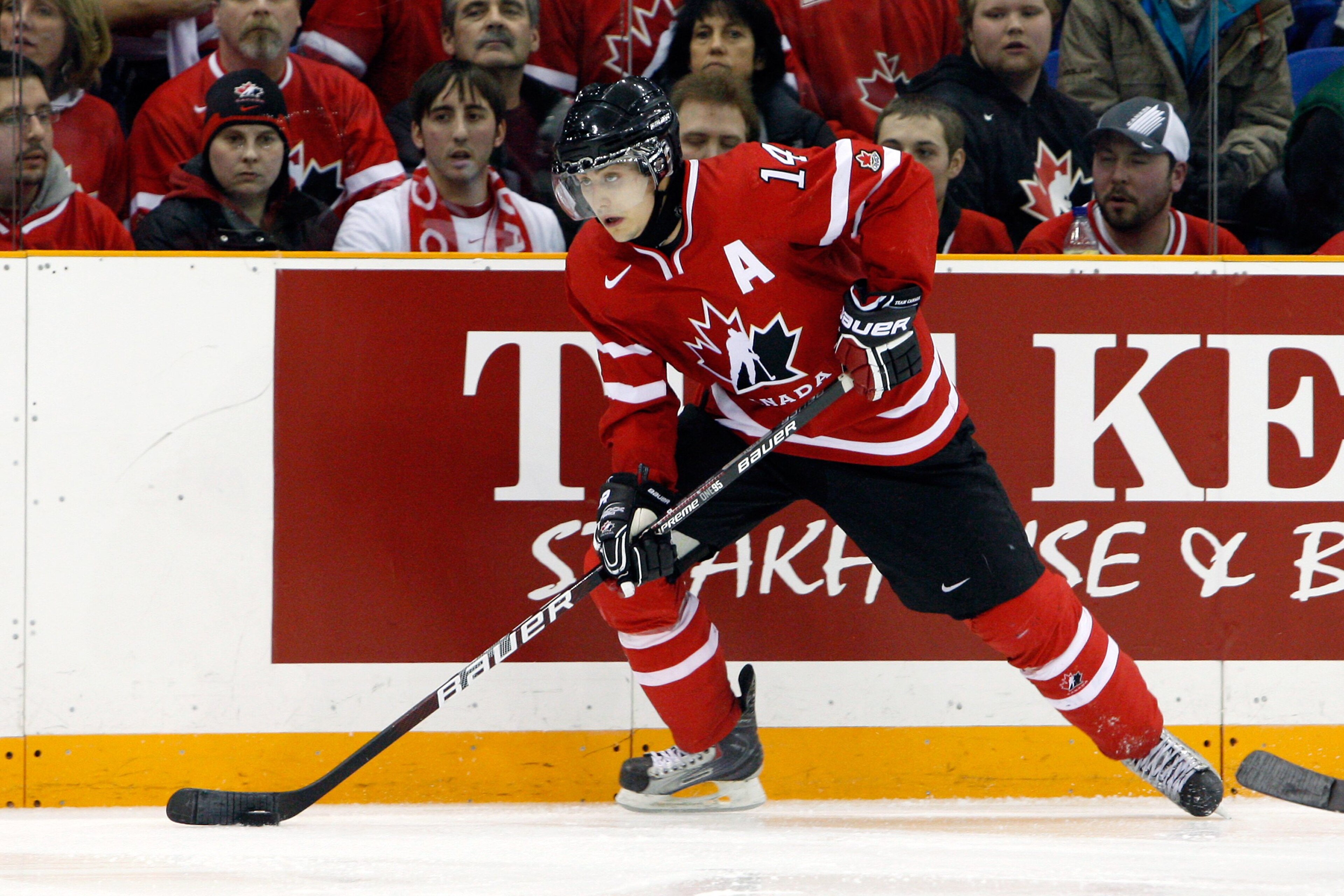 SASKATOON, SK - JANUARY 5:  Jordan Eberle #14 of Team Canada skates with the puck during the 2010 IIHF World Junior Championship Tournament Gold Medal game against Team USA on January 5, 2010 at the Credit Union Centre in Saskatoon, Saskatchewan, Canada.