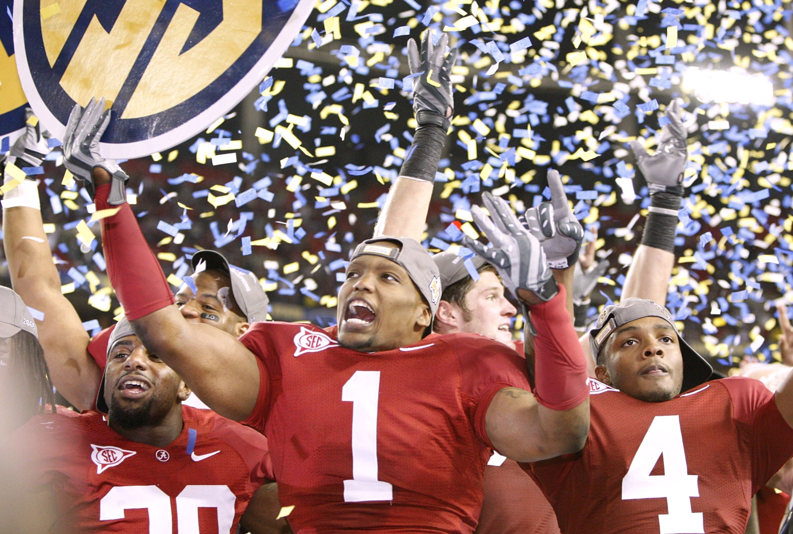 ATLANTA - DECEMBER 5:  B.J. Scott #1 of the Alabama Crimson Tide celebrates as confetti falls after their 32-13 win against the Florida Gators during the SEC Championship game at Georgia Dome on December 5, 2009 in Atlanta, Georgia.  (Photo by Kevin C. Co