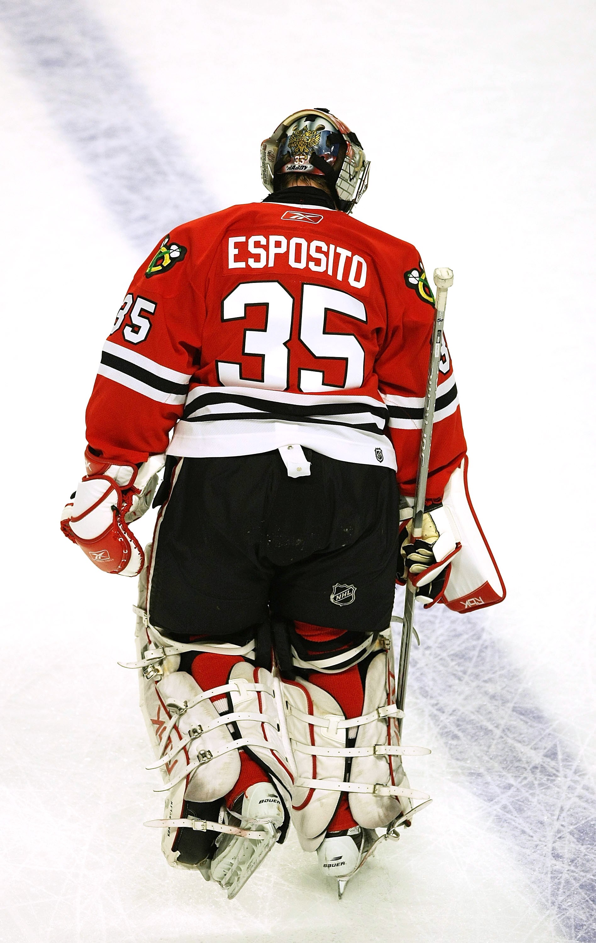 CHICAGO - MARCH 19: Goaltender Nikolai Khabibulin of the Chicago Blackhawks wears a jersey honoring former Blackhawk goaltender Tony Esposito during warm-ups before a game against the Washington Capitals on March 19, 2008 at the United Center in Chicago,