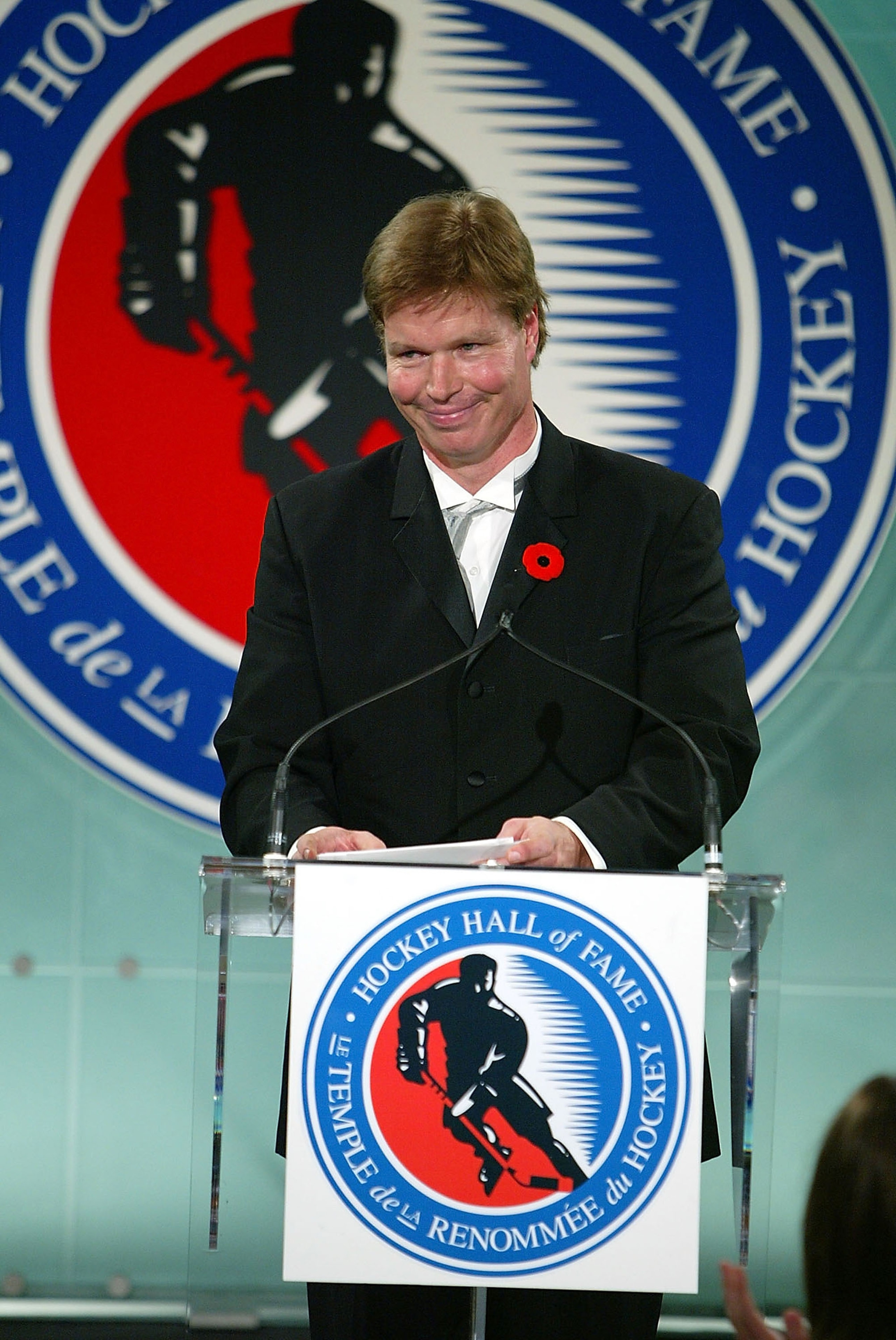 TORONTO - NOVEMBER 8:  Larry Murphy gives a speech during the Hockey Hall of Fame Induction Ceremony on November 8, 2004 at the Hockey Hall of Fame in Toronto, Ontario.  (Photo by Dave Sandford/Hockey Hall of Fame via Getty Images)