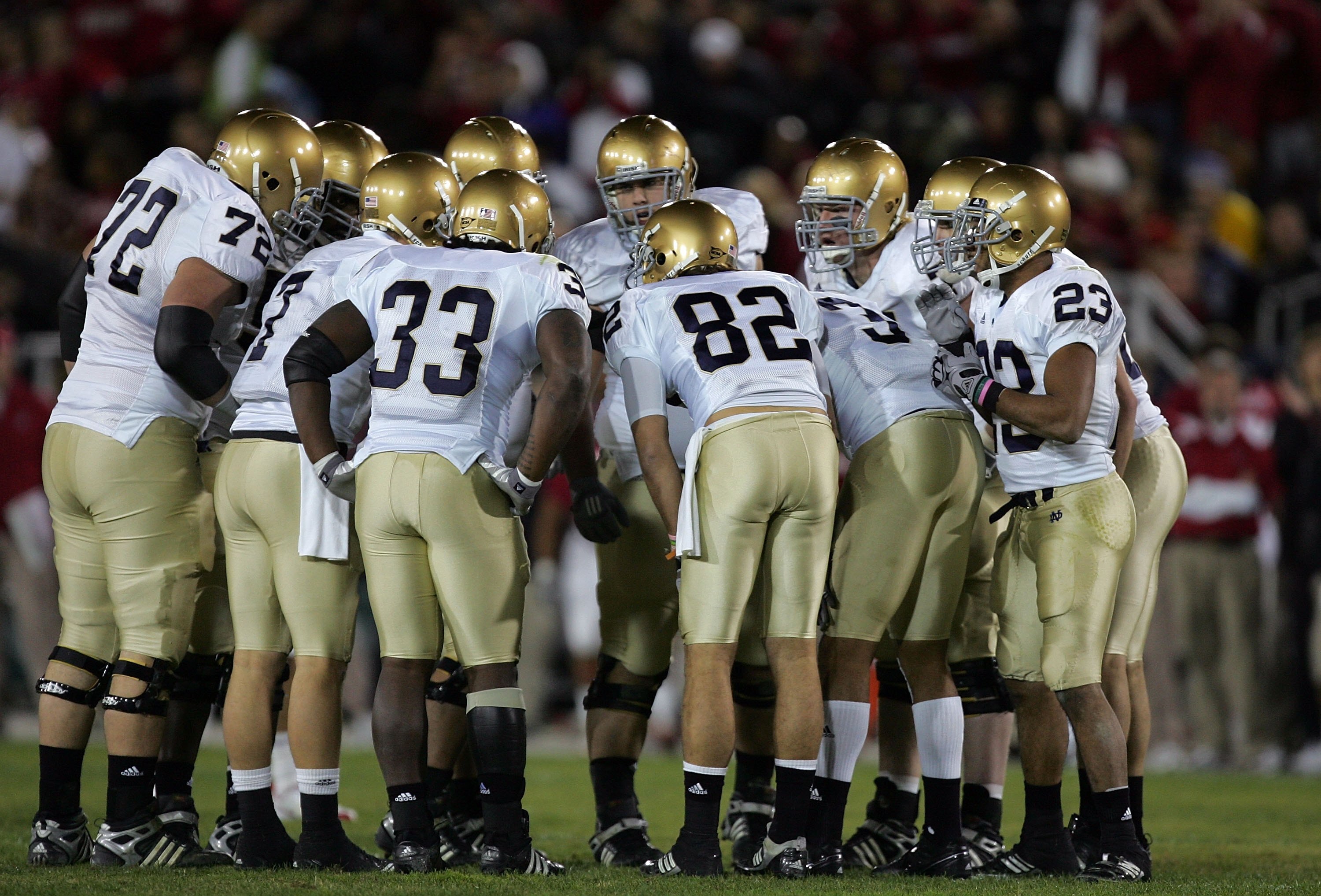 PALO ALTO, CA - NOVEMBER 28:  The Notre Dame Fighting Irish offense huddles up during their game against the Stanford Cardinal at Stanford Stadium on November 28, 2009 in Palo Alto, California.  (Photo by Ezra Shaw/Getty Images)