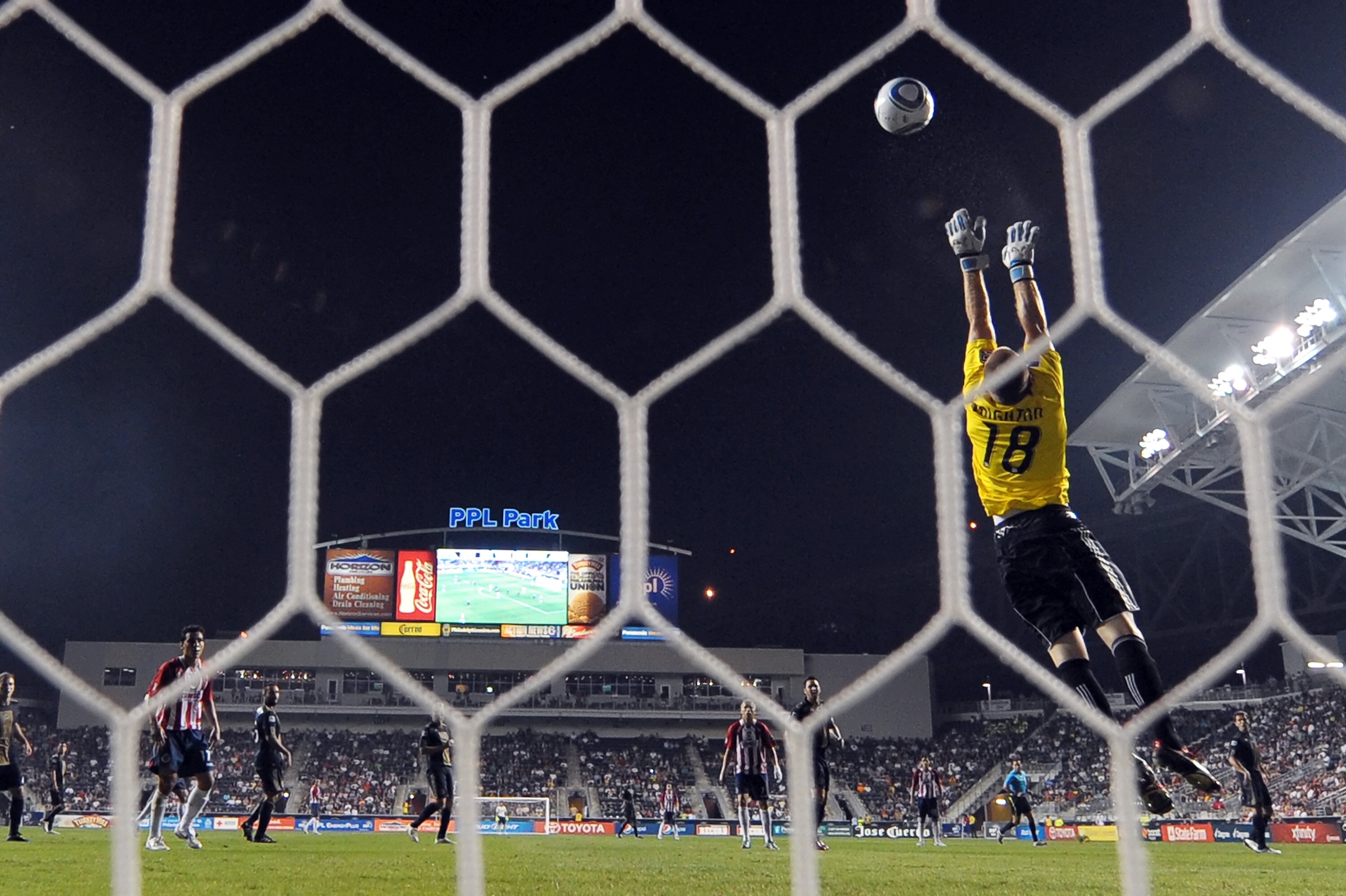 CHESTER, PA - SEPTEMBER 01:  Brad Knighton #18 of the Philadelphia Union makes a save during the game against Chivas de Guadalajara at PPL Park on September 1, 2010 in Chester, Pennsylvania. The Union won 1-0. (Photo by Drew Hallowell/Getty Images)