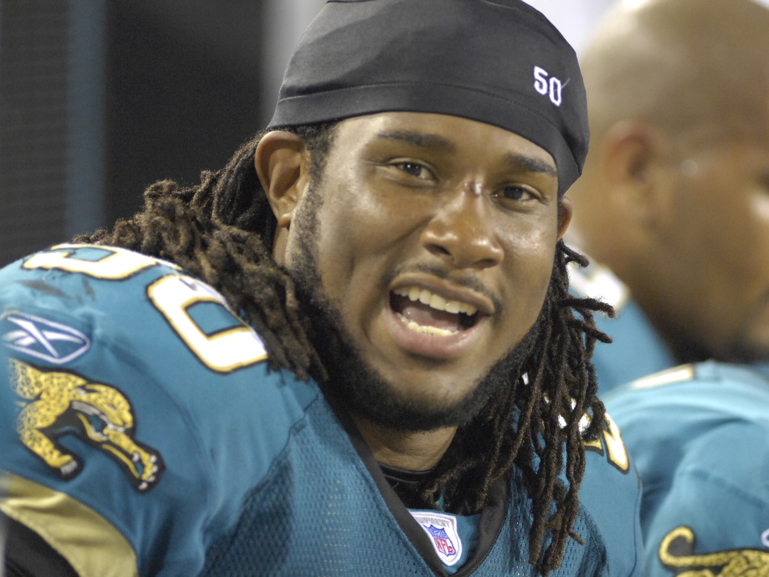 JACKSONVILLE, FL - AUGUST 18: Linebacker Tony Gilbert #50 of the Jacksonville Jaguars watches play against the Tampa Bay Buccaneers  at Jacksonville  Municipal Stadium on August 18, 2007 in Jacksonville, Florida. (Photo by Al Messerschmidt/Getty Images)