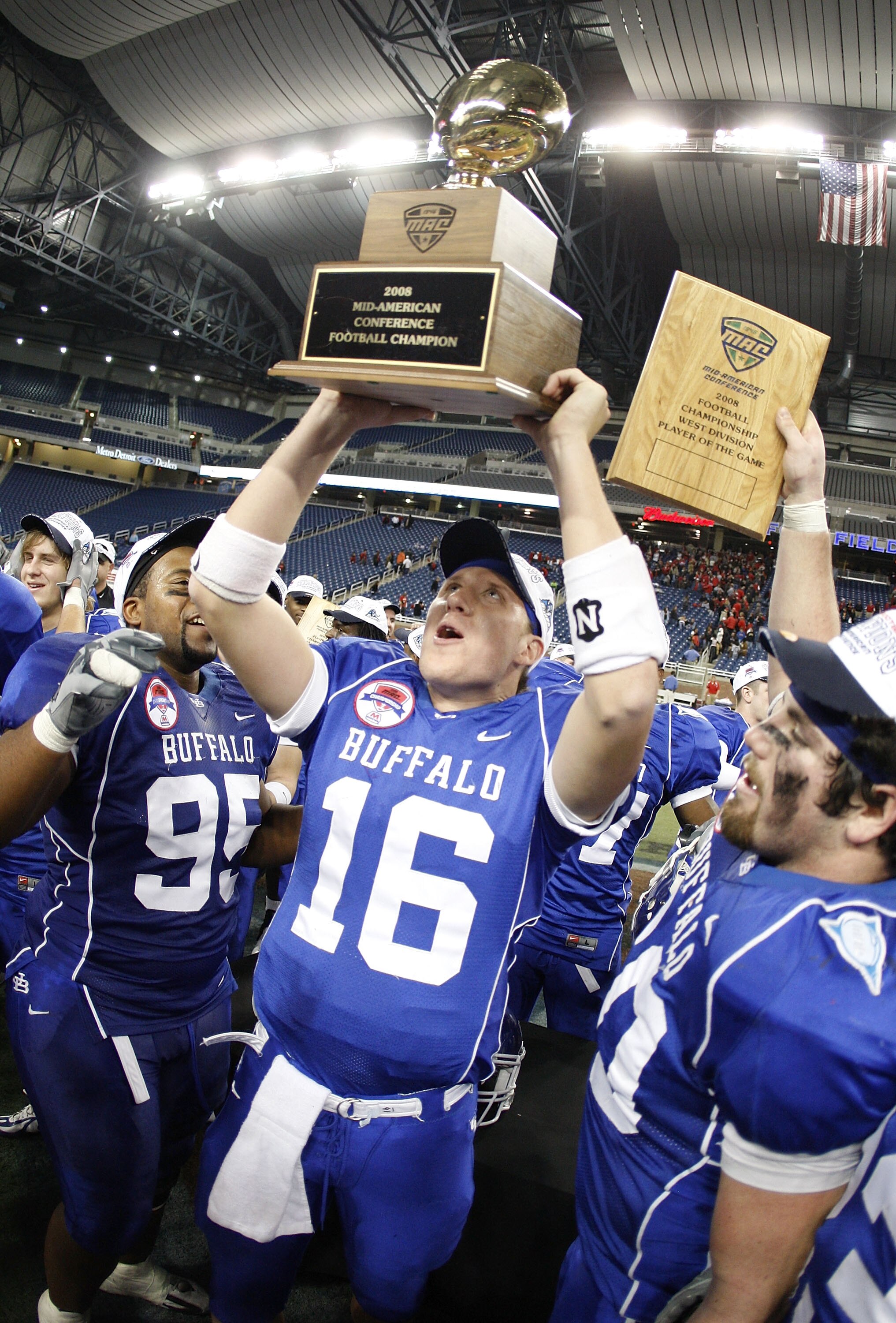 DETROIT - DECEMBER 05: Drew Willy #16 of the Buffalo Bulls celebrates with teammates the MAC Championship after defeating the Ball State Cardinals on December 5, 2008 at Ford Field in Detroit, Michigan. (Photo by Gregory Shamus/Getty Images)