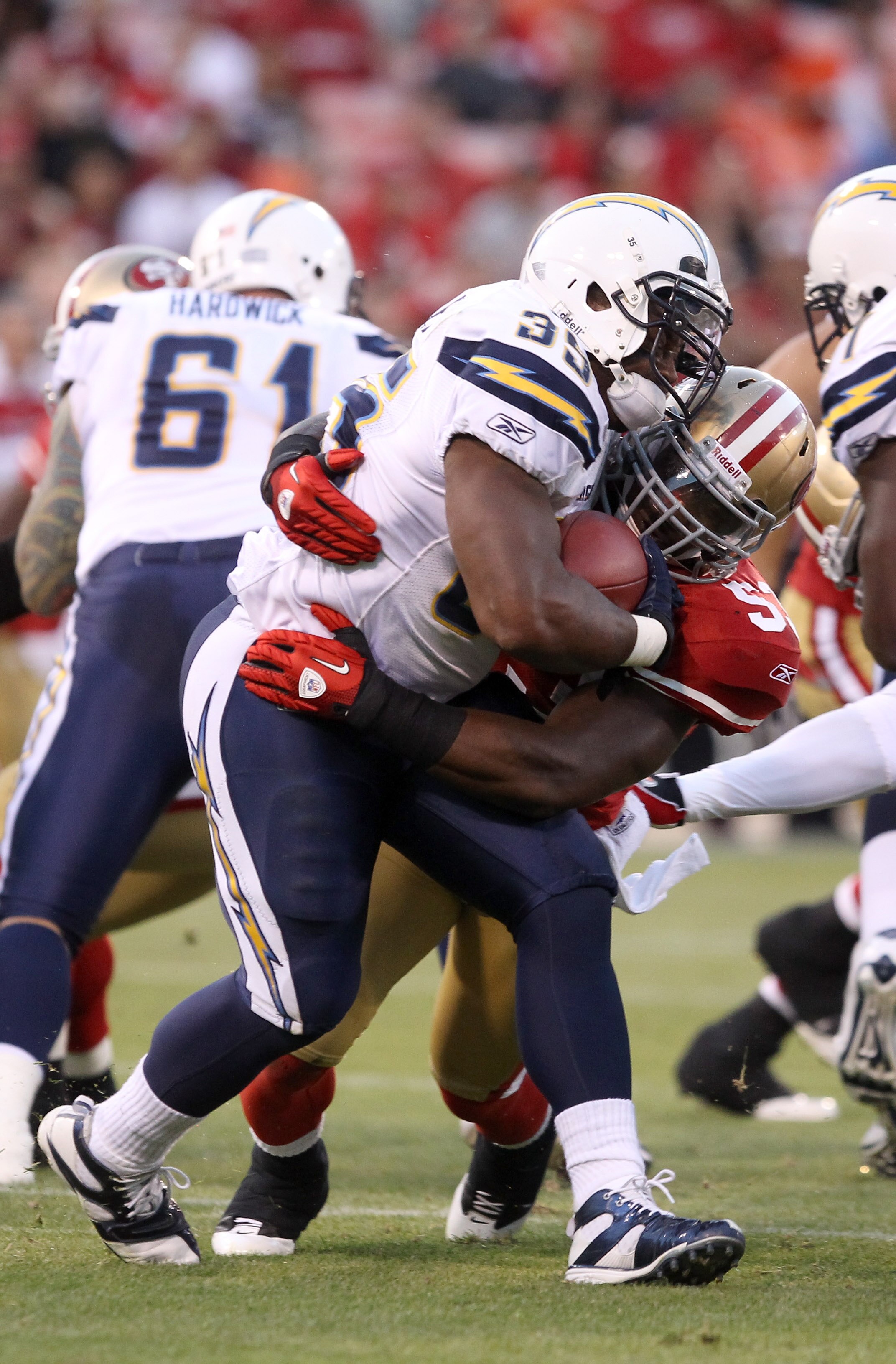 SAN FRANCISCO - SEPTEMBER 02:  Mike Tolbert #35 of the San Diego Chargers is tackled by NaVorro Bowman #53 of the San Francisco 49ers at Candlestick Park  on September 2, 2010 in San Francisco, California.  (Photo by Ezra Shaw/Getty Images)