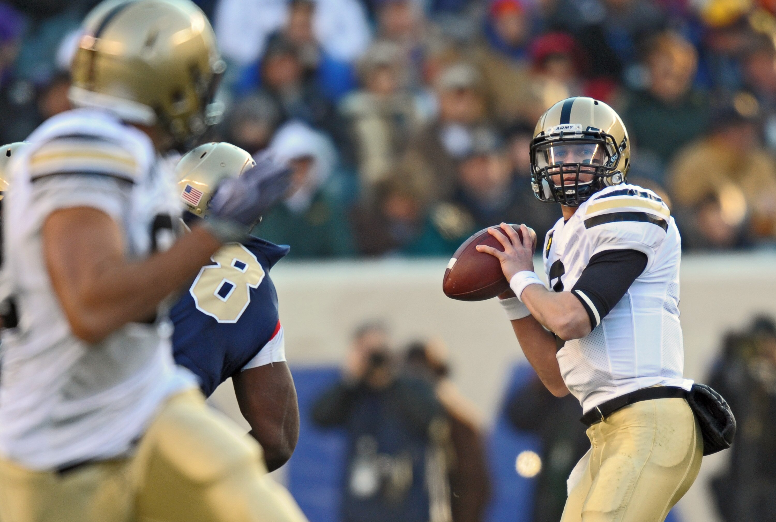PHILADELPHIA - DECEMBER 12: Quarterback Trent Steelman #8 of  the Army Black Knights looks downfield for a receiver during the game against the Navy Midshipmen on December 12, 2009 at Lincoln Financial Field in Philadelphia, Pennsylvania. Navy won 17-3. (