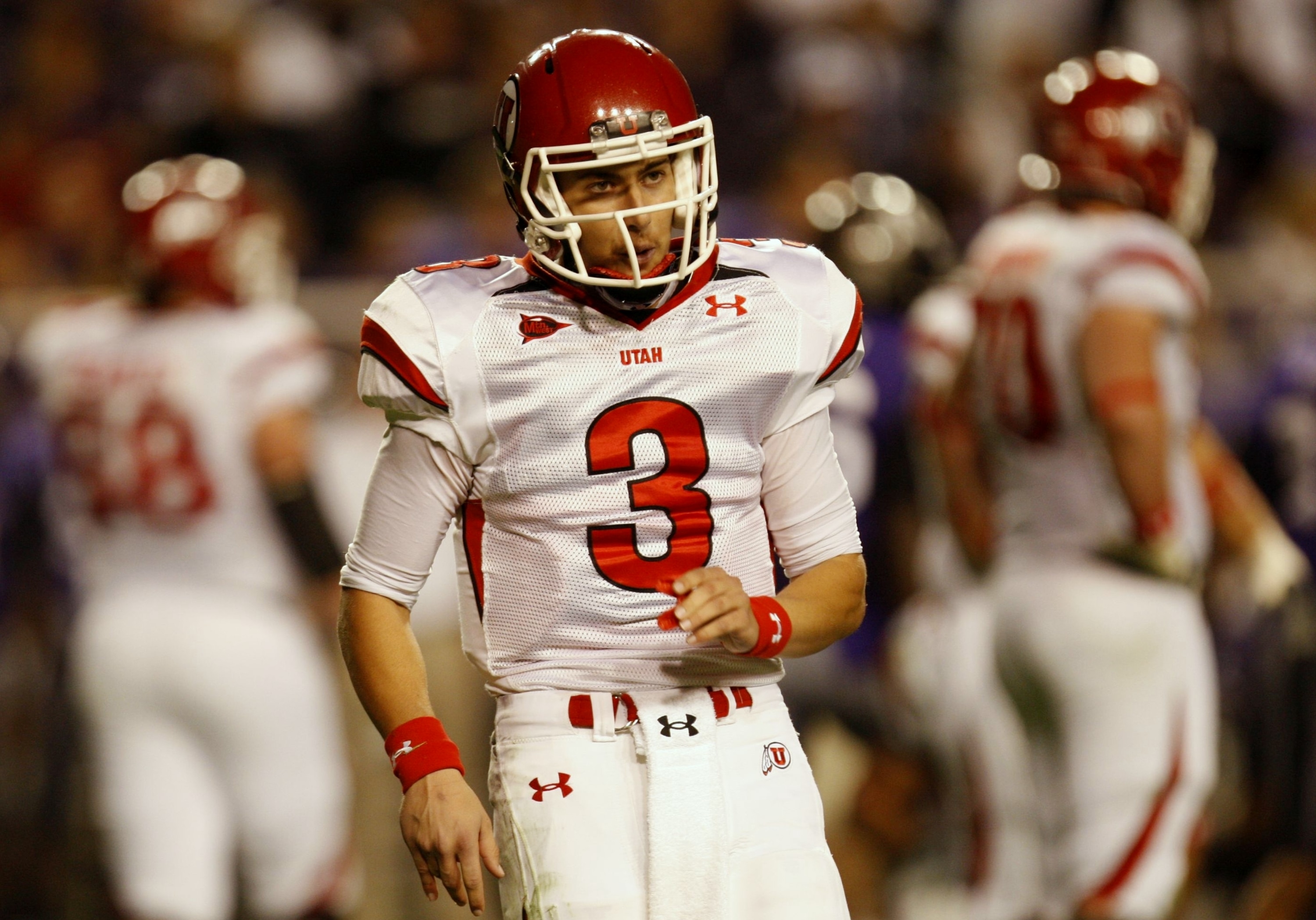 FORT WORTH, TX - NOVEMBER 14:  Quarterback Jordan Wynn #3 of the Utah Utes reacts in the second quarter of the game against the TCU Horned Frogs at Amon G. Carter Stadium on November 14, 2009 in Fort Worth, Texas.  (Photo by Ronald Martinez/Getty Images)