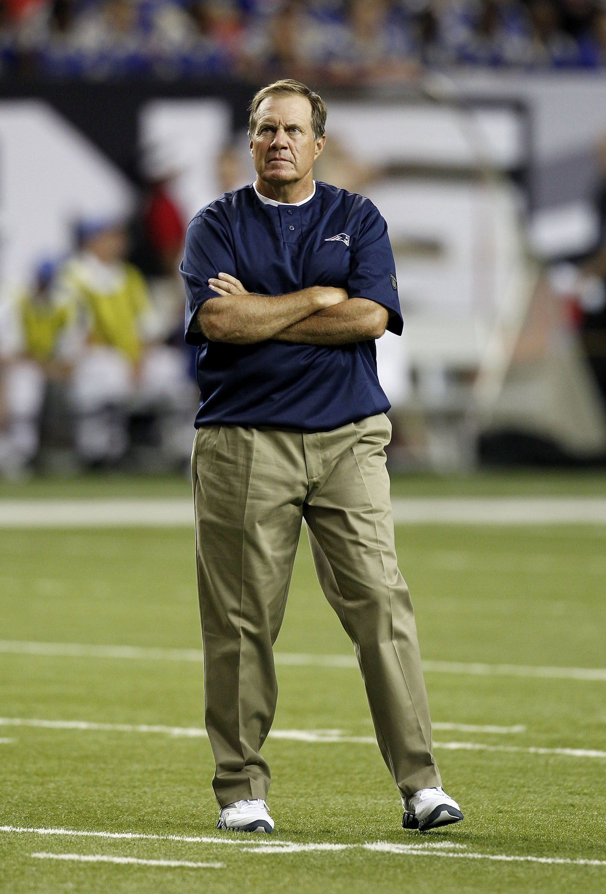 ATLANTA - AUGUST 19:  Head coach Bill Belichick of the New England Patriots watches pre-game drills before the preseason game against the Atlanta Falcons at the Georgia Dome on August 19, 2010 in Atlanta, Georgia.  (Photo by Mike Zarrilli/Getty Images)