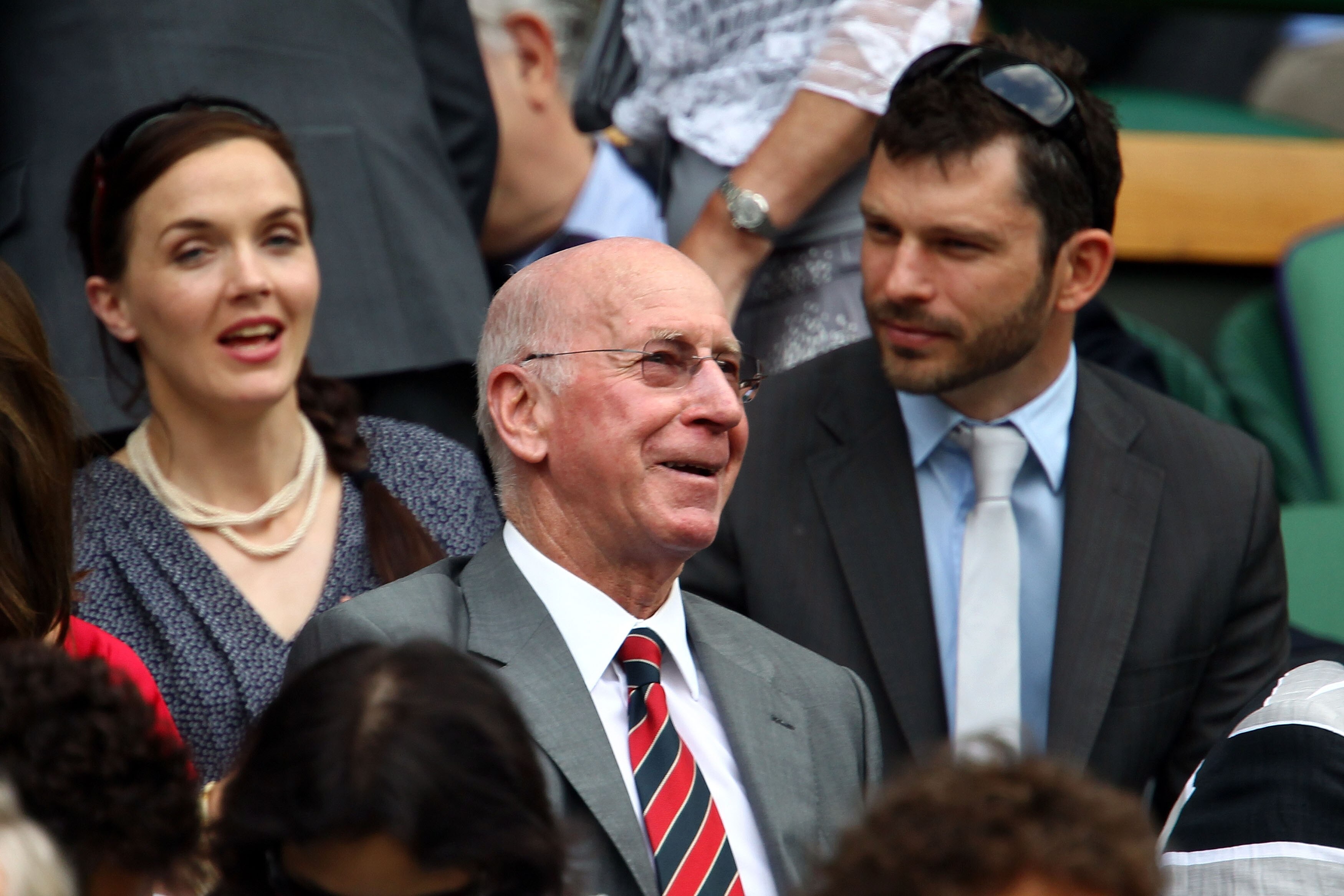 LONDON, ENGLAND - JUNE 26:  Victoria Pendleton (L) and Sir Bobby Charlton (C) watch a match at Centre Court on Day Six of the Wimbledon Lawn Tennis Championships at the All England Lawn Tennis and Croquet Club on June 26, 2010 in London, England.  (Photo
