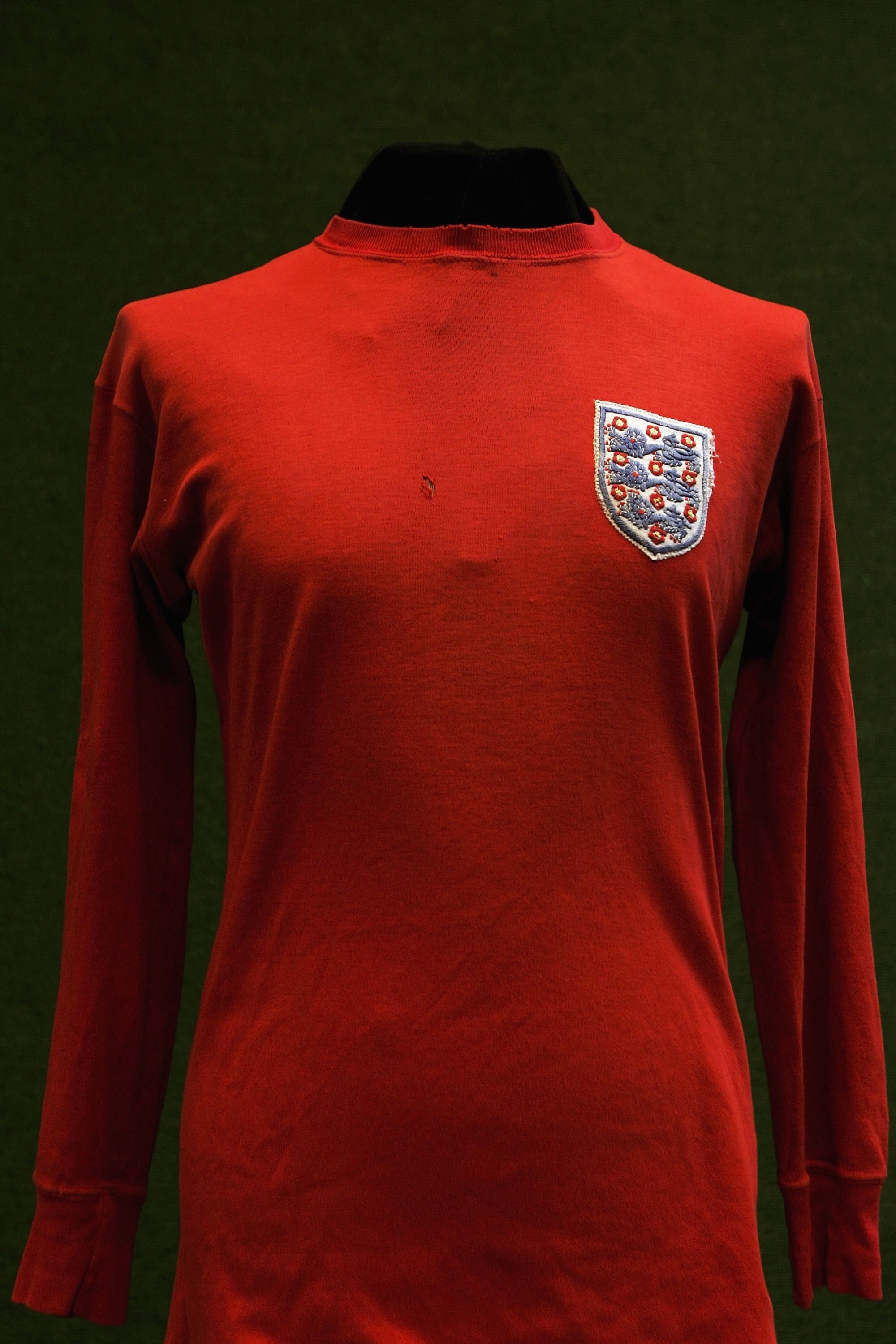 LONDON - MAY 16:  A 1966 World cup football shirt worn by George Cohen during the final at Wembley is displayed at Christies Auctioneers before its sale on May 16, 2006 in London, England.  (Photo by Bruno Vincent/Getty Images)