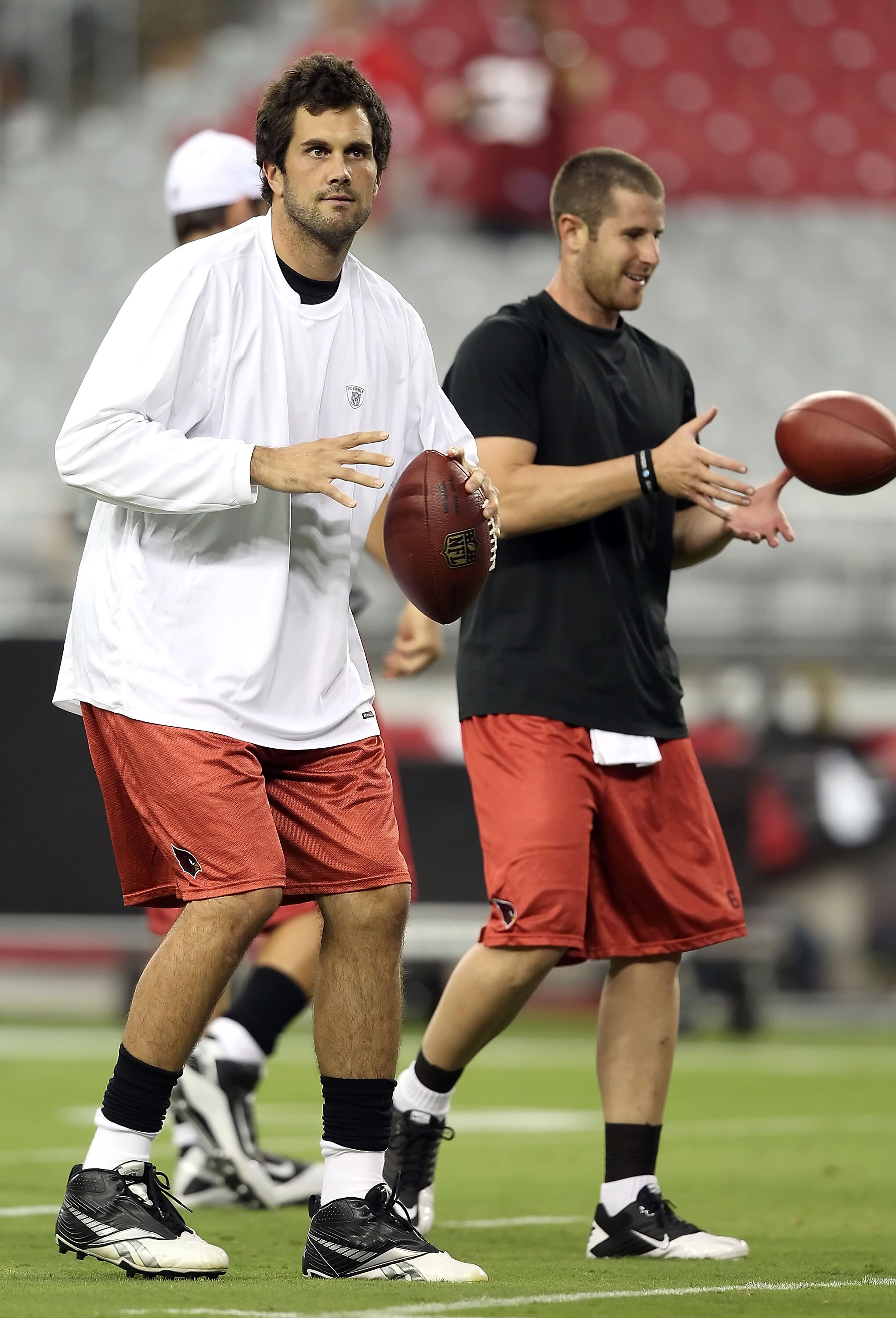 GLENDALE, AZ - SEPTEMBER 02:  Quarterbacks Matt Leinart #7 and Max Hall #6 of the Arizona Cardinals warm up before the preseason NFL game against the Washington Redskins at the University of Phoenix Stadium on September 2, 2010 in Glendale, Arizona.  (Pho