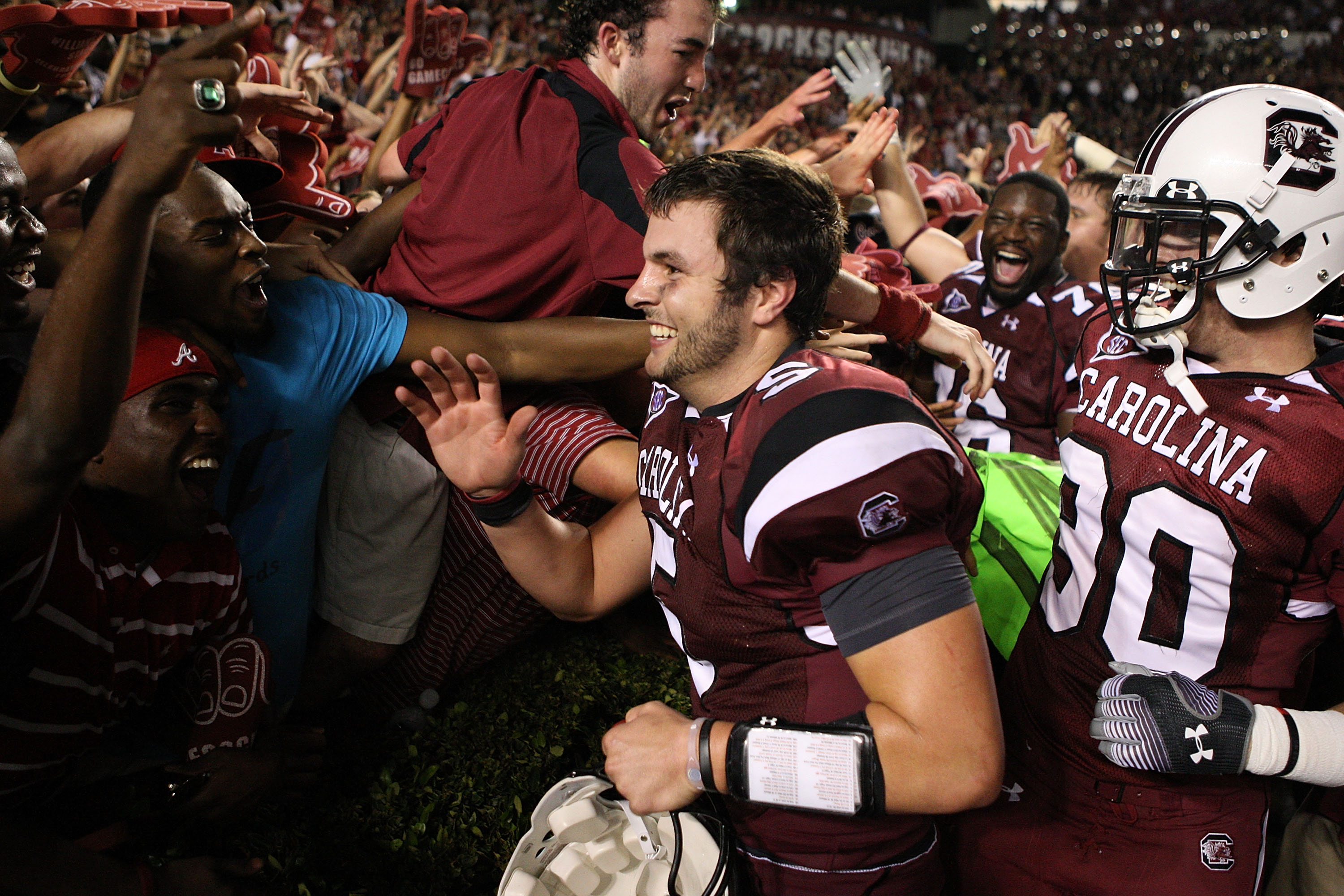 COLUMBIA, SC - SEPTEMBER 24:  Stephen Garcia #5 of the South Carolina Gamecocks celebrates with fans after a 16-10 vicotry over the Ole Miss Rebels after their game at Williams-Brice Stadium on September 24, 2009 in Columbia, South Carolina.  (Photo by St