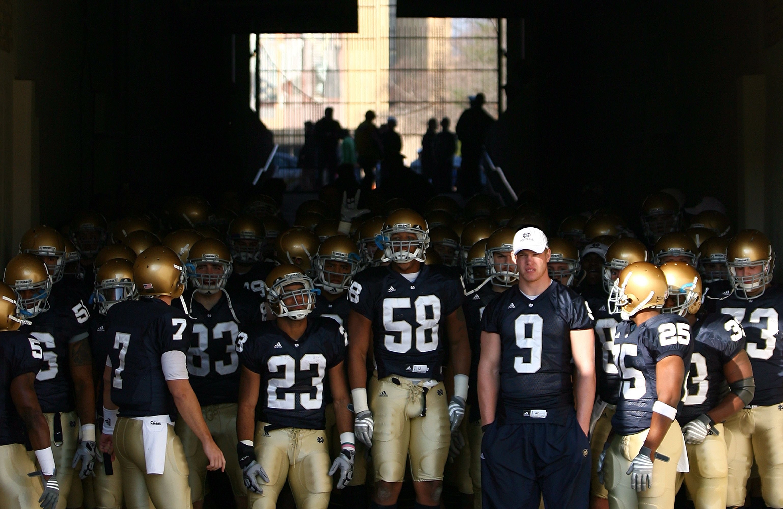 SOUTH BEND, IN - NOVEMBER 21: Members of the Notre Dame Fighting Irish wait to walk out of the tunnel before lining up to enter the field for a game against the Univeristy of Connecticut Huskies at Notre Dame Stadium on November 21, 2009 in South Bend, In