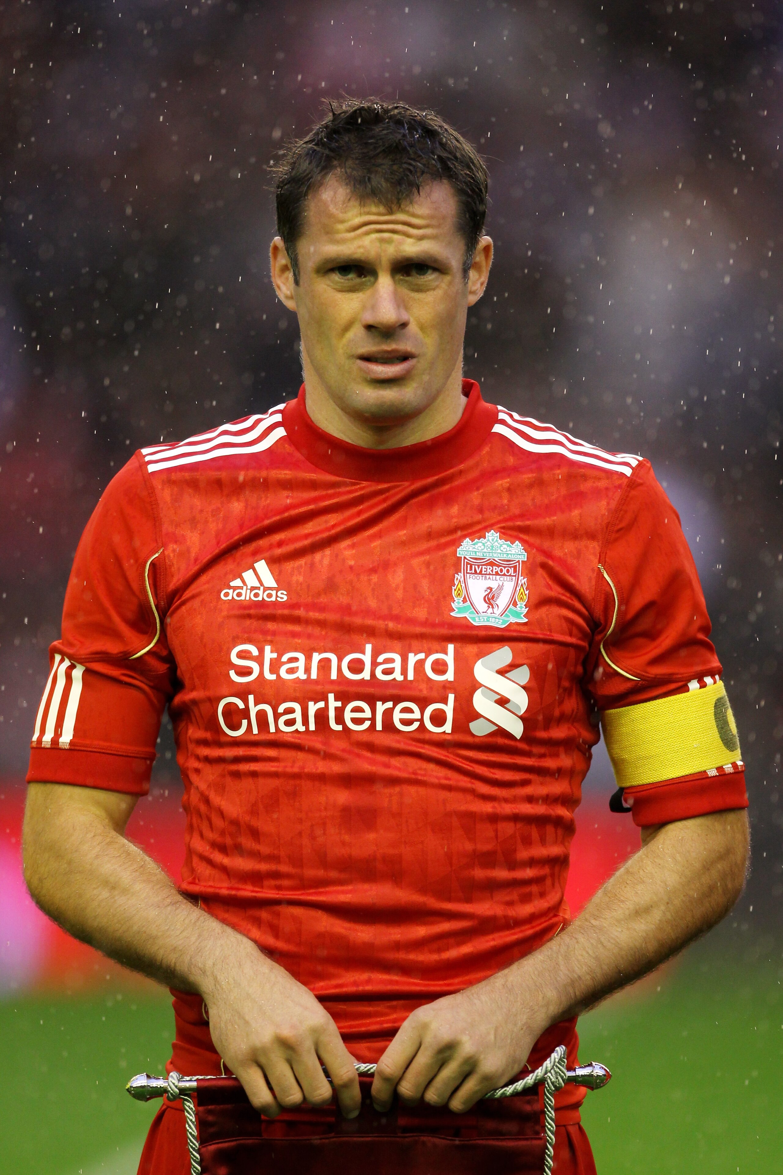 LIVERPOOL, ENGLAND - AUGUST 19:  Jamie Carragher of Liverpool looks on prior to the UEFA Europa League play-off first leg match beteween Liverpool and Trabzonspor at Anfield on August 19, 2010 in Liverpool, England.  (Photo by Alex Livesey/Getty Images)