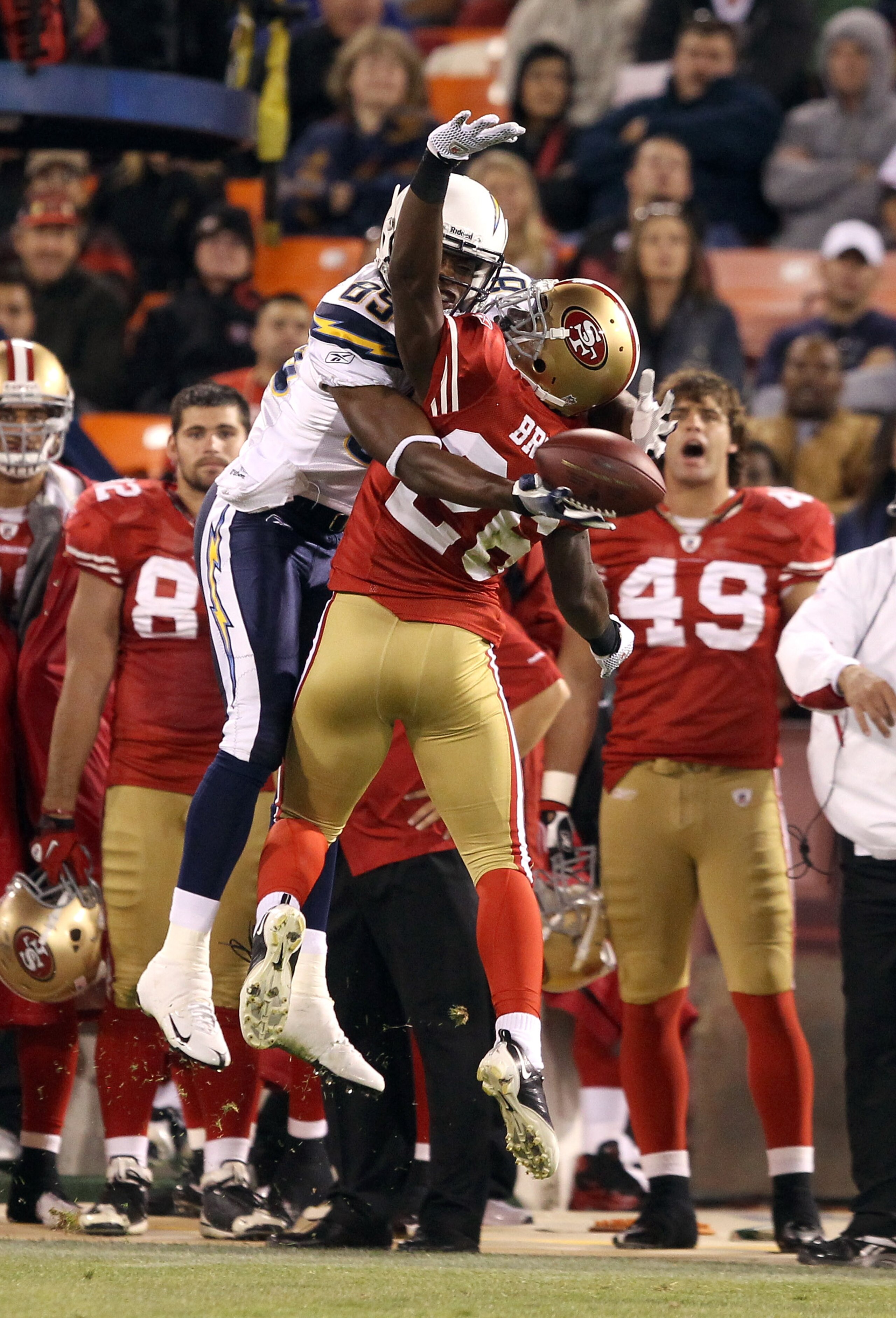 SAN FRANCISCO - SEPTEMBER 02:  Tramaine Brock #26 of the San Francisco 49ers is called for pass interference when he tried to break up a pass intended for Seyi Ajirotutu #89 of the San Diego Chargers at Candlestick Park  on September 2, 2010 in San Franci