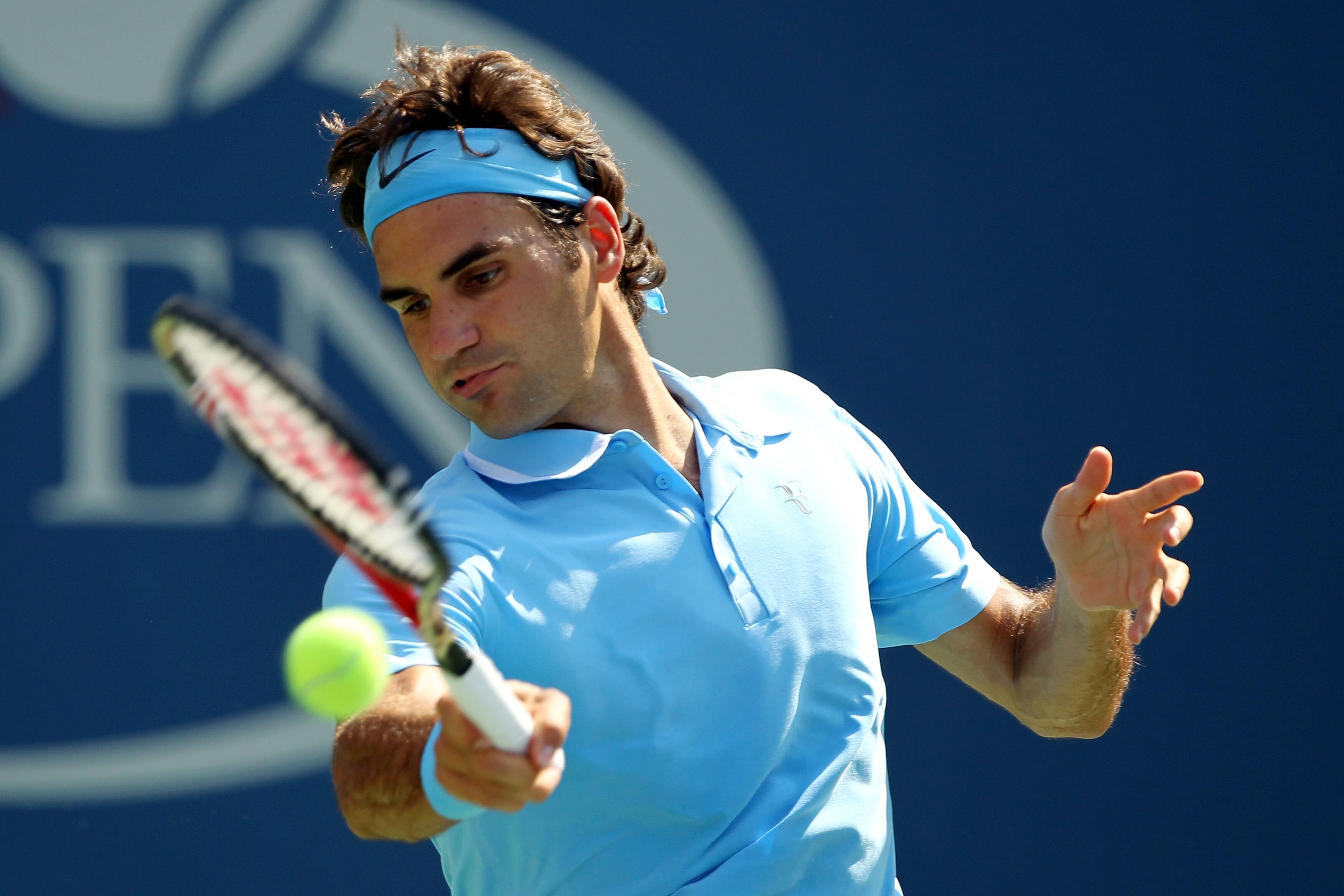 NEW YORK - SEPTEMBER 02:  Roger Federer of Switzerland returns a shot to Andreas Beck of Germany during the Men's singles on day four of the 2010 U.S. Open at the USTA Billie Jean King National Tennis Center on September 2, 2010 in the Flushing neighborho