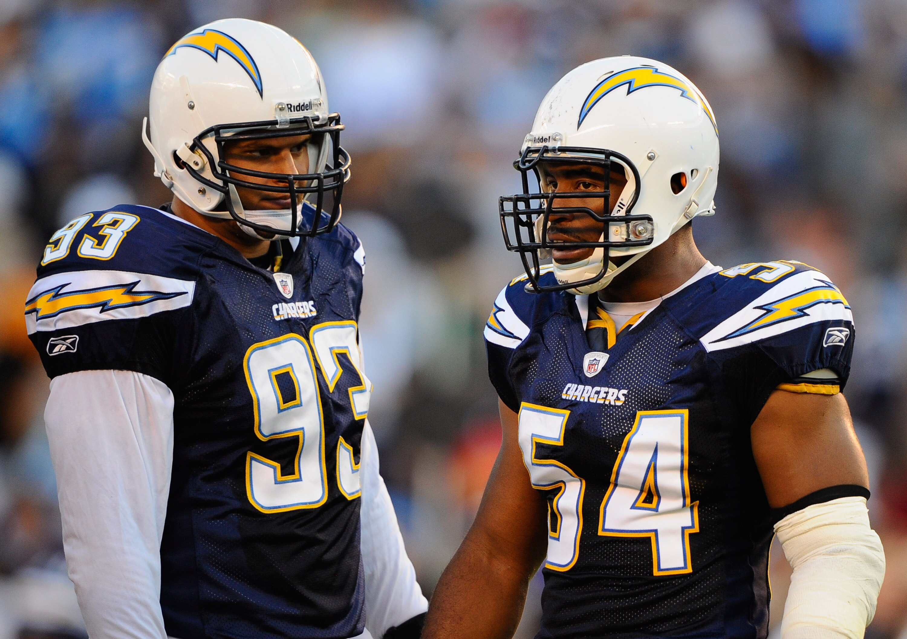 SAN DIEGO - AUGUST 21:  Luis Castillo #93 and Stephen Cooper #54 of the San Diego Chargers during the pre-season NFL football game against Dallas Cowboys at Qualcomm Stadium on August 21, 2010 in San Diego, California.  (Photo by Kevork Djansezian/Getty I