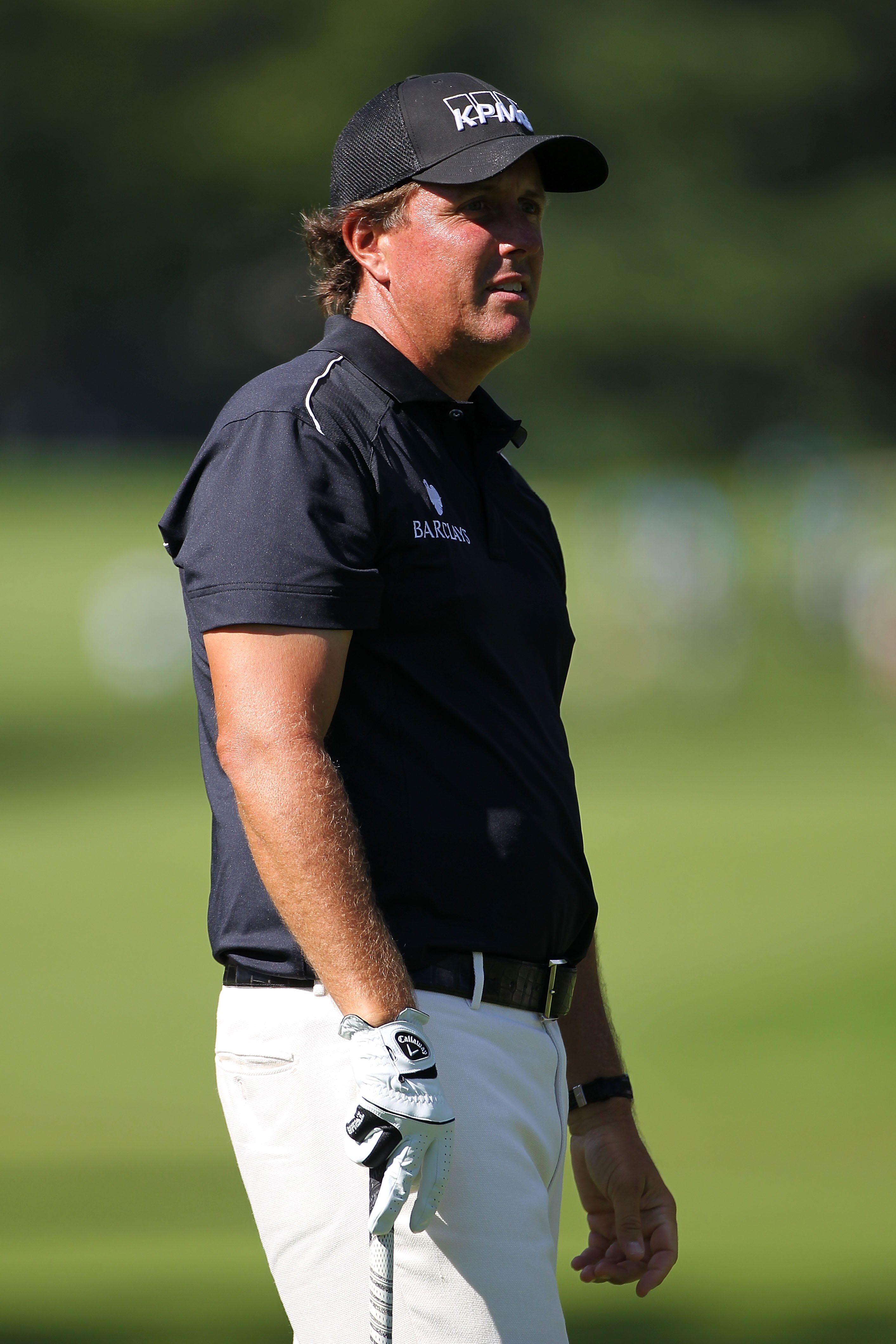 PARAMUS, NJ - AUGUST 27:  Phil Mickelson watches the flight of his ball on his third shot on the 17th hole during the second round of The Barclays at the Ridgewood Country Club on August 27, 2010 in Paramus, New Jersey.  (Photo by Hunter Martin/Getty Imag