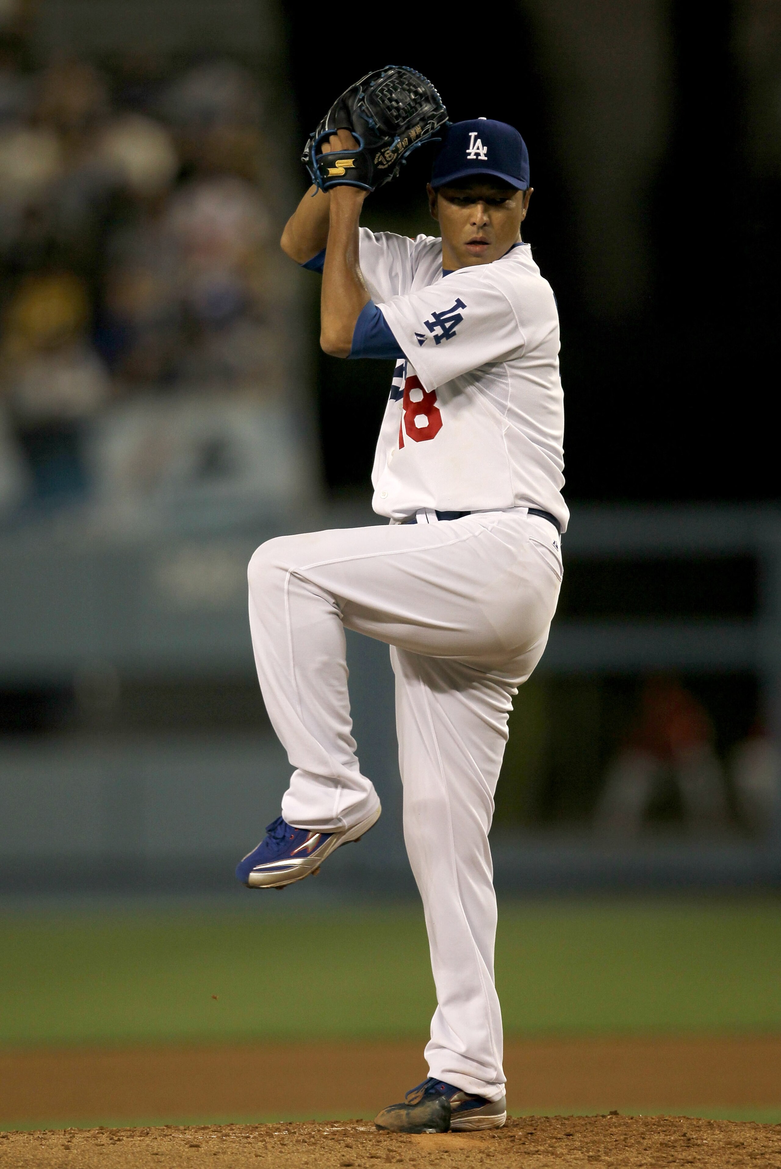 LOS ANGELES, CA - AUGUST 30:  Hiroki Kuroda #18 of the Los Angeles Dodgers throws a pitch against the Philadelphia Phillies on August 30, 2010 at Dodger Stadium  in Los Angeles, California.  (Photo by Stephen Dunn/Getty Images)