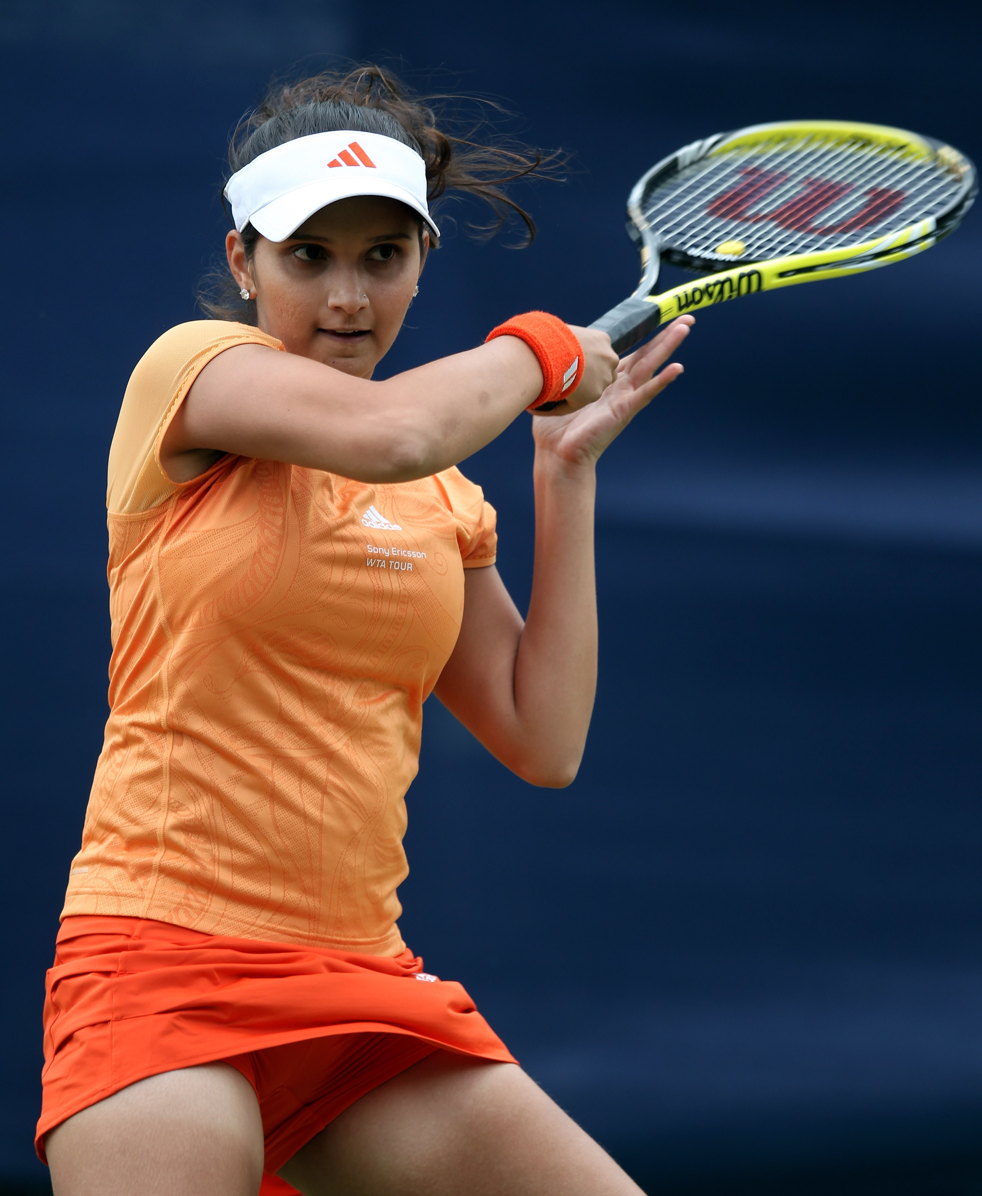 BIRMINGHAM, ENGLAND - JUNE 09: Sania Mirza if India during the second round match match at The AEGON Classic between Sania Mirza and Tamarine Tanasugarn at the Edgbaston Priory Club on June 9, 2010 in Birmingham, England. (Photo by Ross Kinnaird/Getty I BIRMINGHAM, ENGLAND - JUNE 09: Sania Mirza if India during the second round match match at The AEGON Classic between Sania Mirza and Tamarine Tanasugarn at the Edgbaston Priory Club on June 9, 2010 in Birmingham, England. (Photo by Ross Kinnaird/Getty I