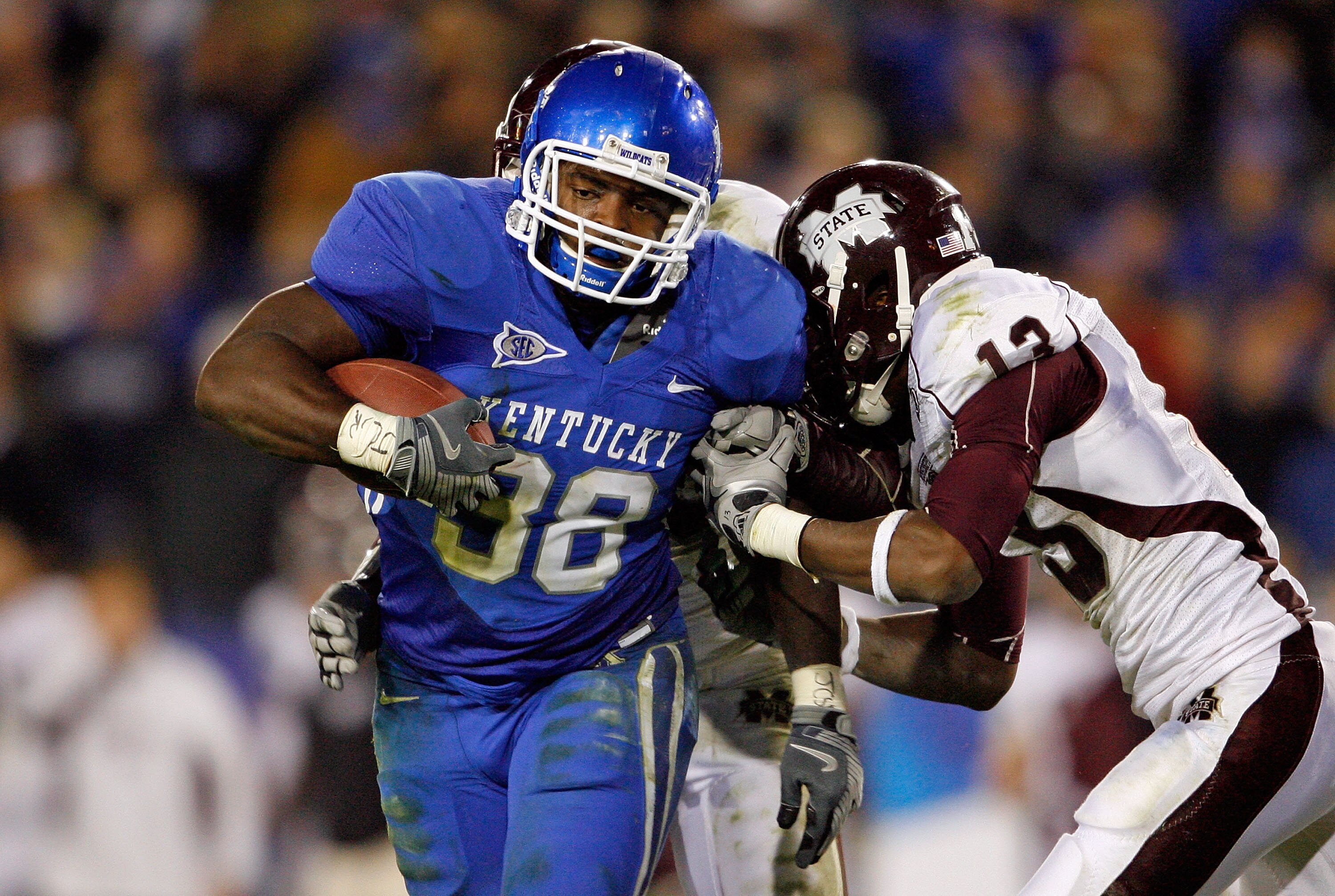 LEXINGTON, KY - OCTOBER 31:  Johnthan Banks #13 of the Mississippi State Bulldogs tackles John Conner #38 of the Kentucky Wildcats during the SEC game at Commonwealth Stadium on October 31, 2009 in Lexington, Kentucky.  (Photo by Andy Lyons/Getty Images)