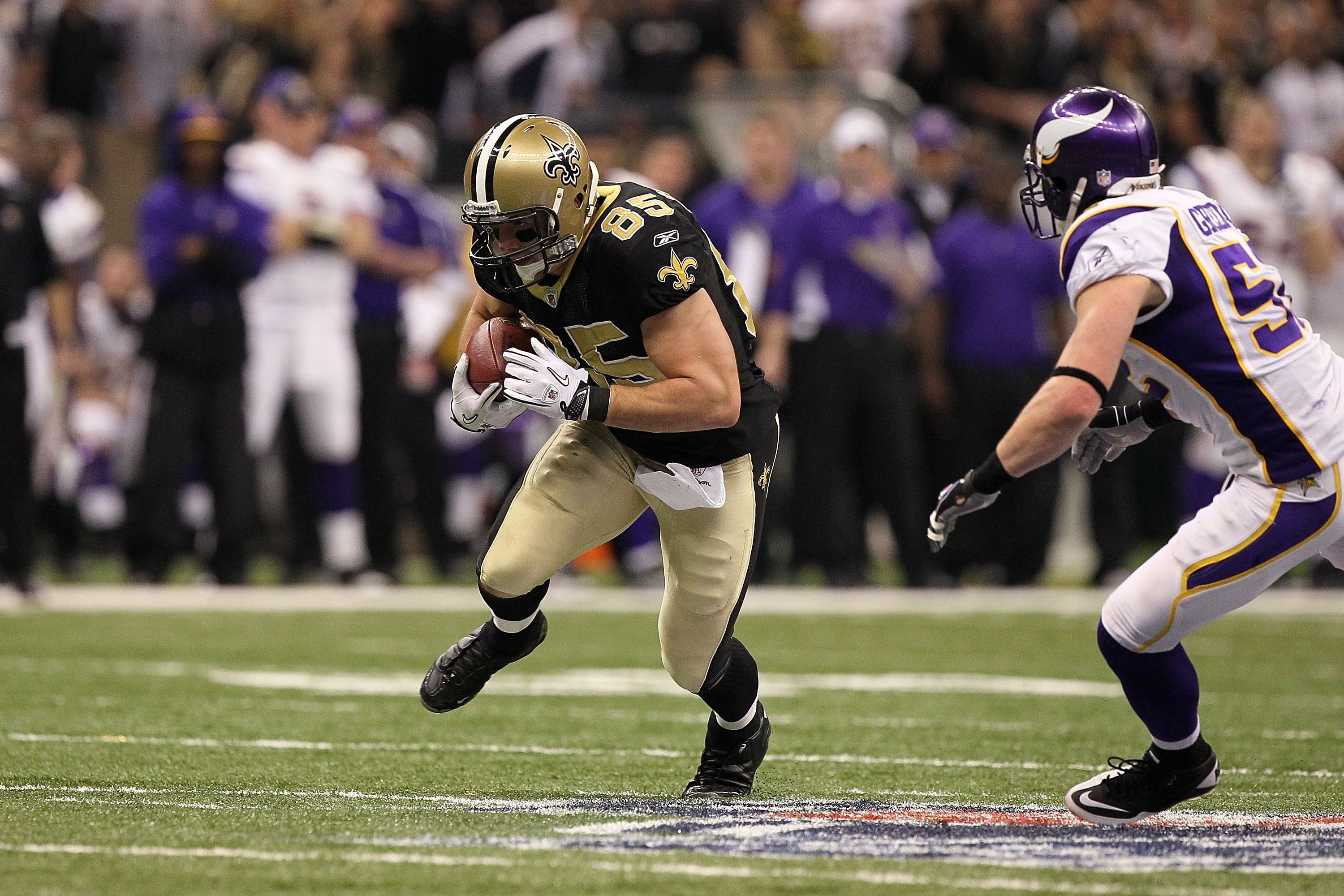 NEW ORLEANS - JANUARY 24: David Thomas #85 of the New Orleans Saints runs for yards after the catch against the Minnesota Vikings during the NFC Championship Game at the Louisiana Superdome on January 24, 2010 in New Orleans, Louisiana. The Saints won 31 NEW ORLEANS - JANUARY 24: David Thomas #85 of the New Orleans Saints runs for yards after the catch against the Minnesota Vikings during the NFC Championship Game at the Louisiana Superdome on January 24, 2010 in New Orleans, Louisiana. The Saints won 31