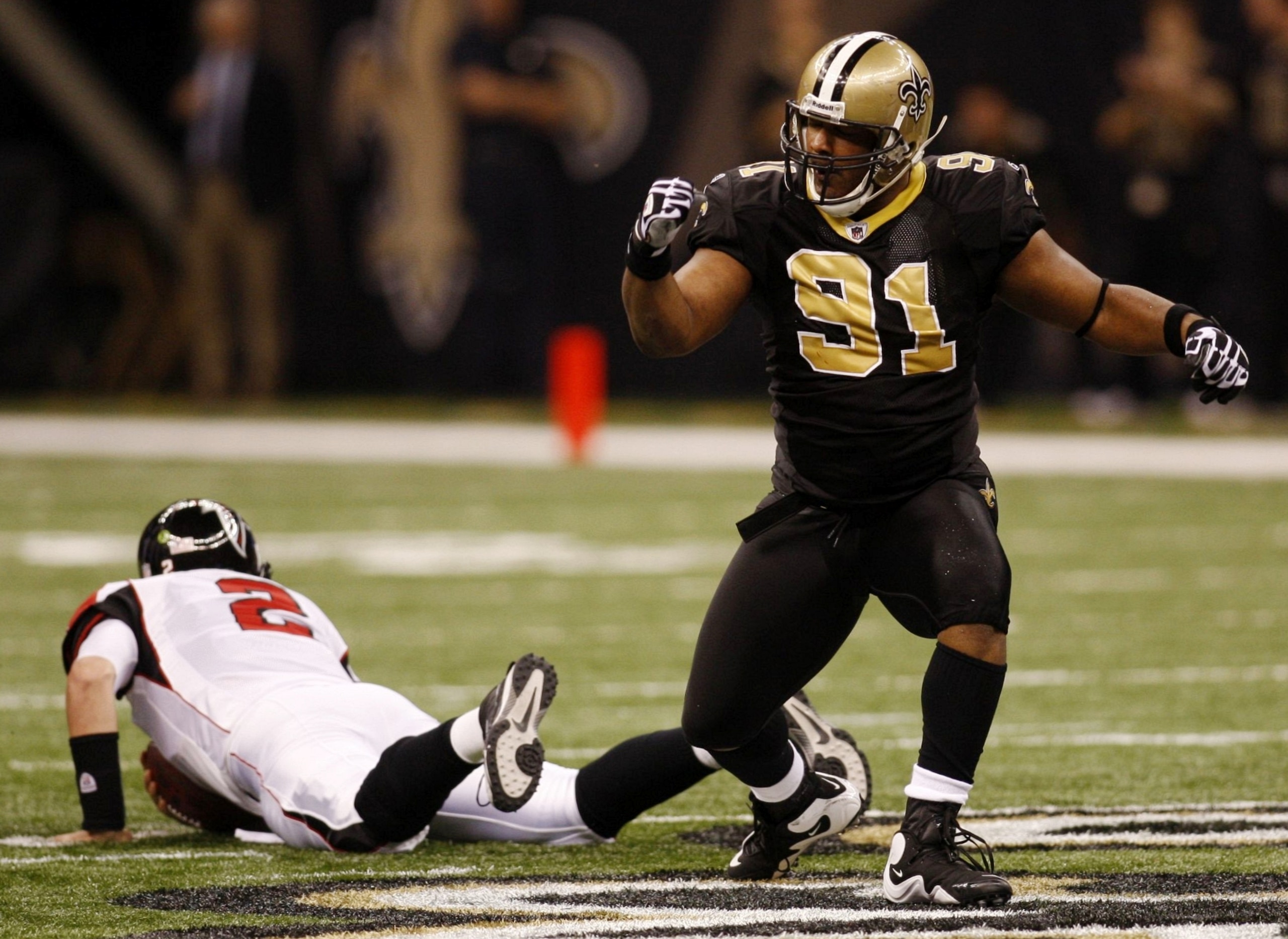 NEW ORLEANS - NOVEMBER 2:  Will Smith #91 of the New Orleans Saints celebrates sacking quarterback Matt Ryan #2 of the Atlanta Falcons during the first quarter of the game at the Louisiana Superdome on November 2, 2009 in New Orleans, Louisiana. (Photo by