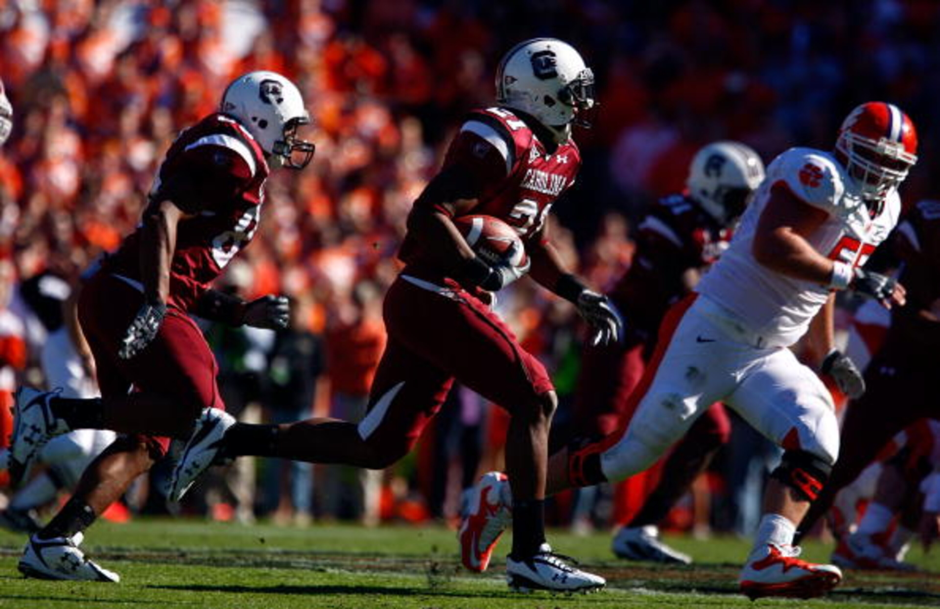 COLUMBIA, SC - NOVEMBER 28:  DeVonte Holloman #21 of the South Carolina Gamecocks returns an interception against the Clemson Tigers at Williams-Brice Stadium on November 28, 2009 in Columbia, South Carolina.  (Photo by Scott Halleran/Getty Images)