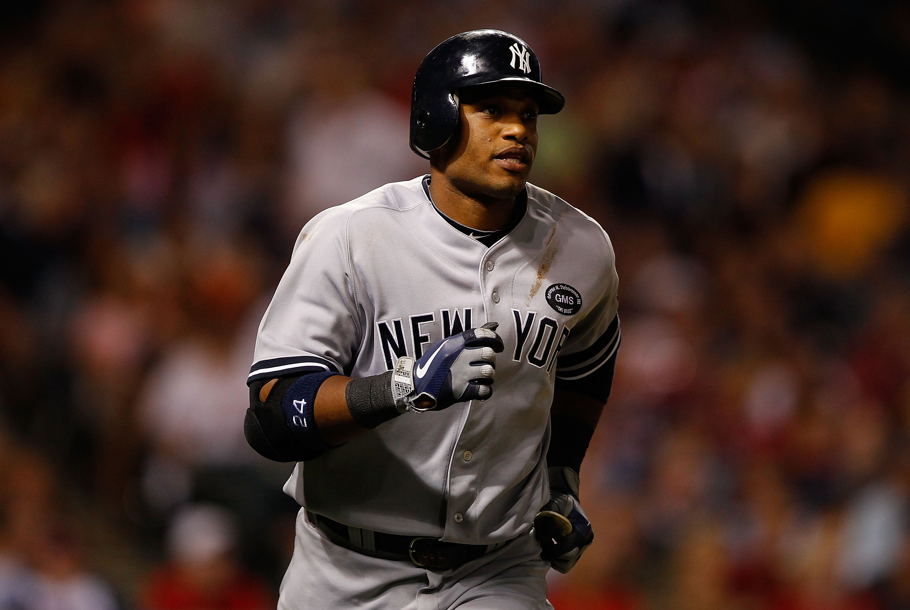 CLEVELAND - JULY 29:  Robinson Cano #24 of the New York Yankees jogs down the first base line after hitting a solo home run in the 7th inning against the Cleveland Indians during the game on July 29, 2010 at Progressive Field in Cleveland, Ohio.  (Photo b