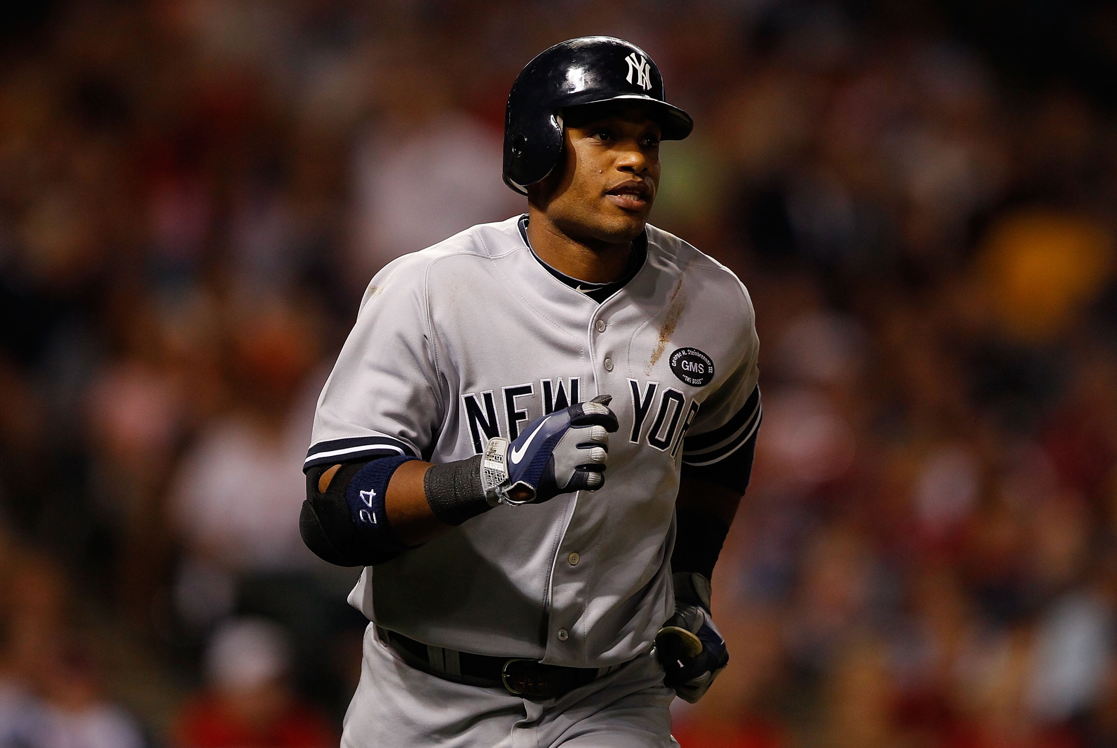 CLEVELAND - JULY 29:  Robinson Cano #24 of the New York Yankees jogs down the first base line after hitting a solo home run in the 7th inning against the Cleveland Indians during the game on July 29, 2010 at Progressive Field in Cleveland, Ohio.  (Photo b
