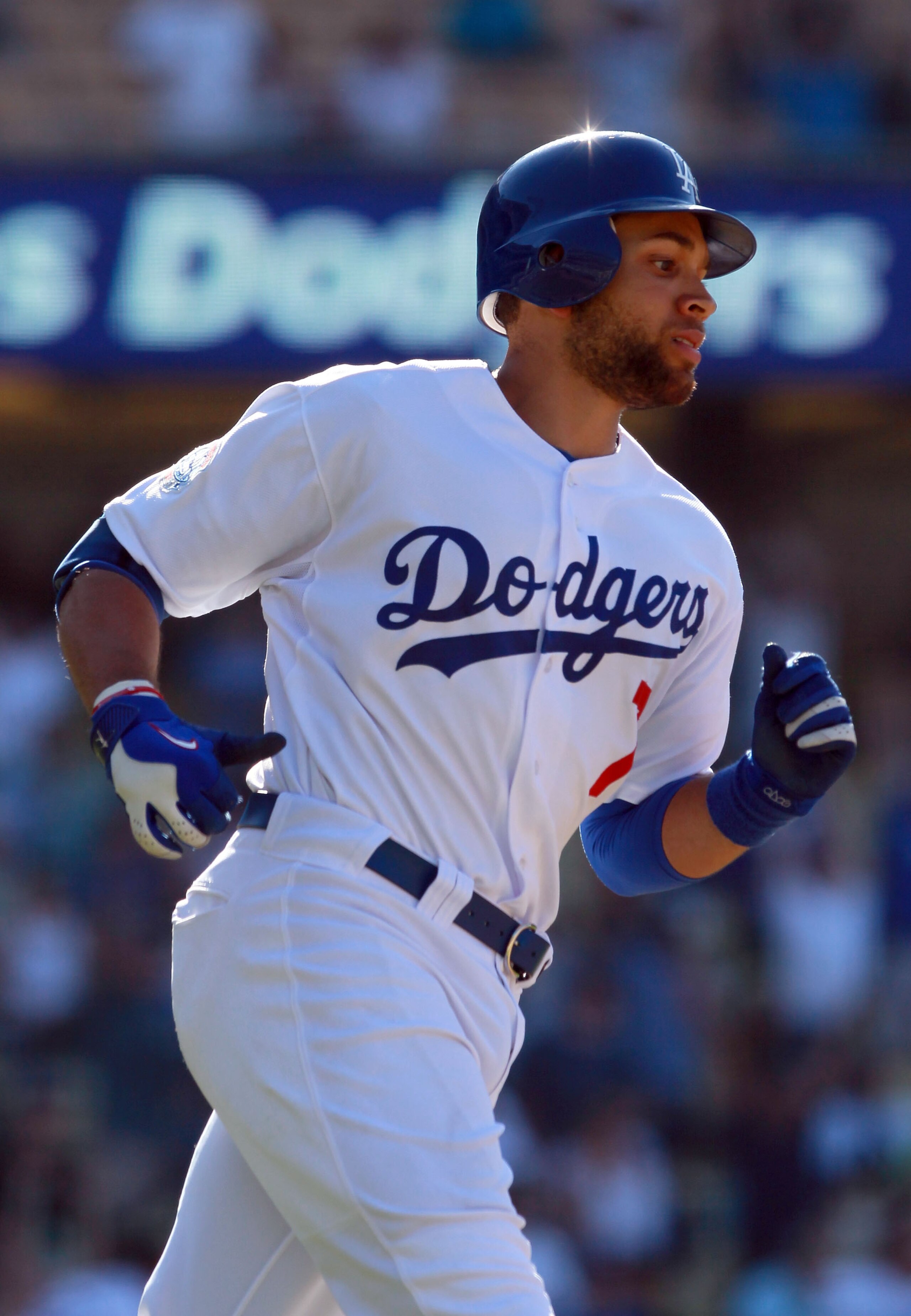 LOS ANGELES, CA - JULY 24:  James Loney #7 of the Los Angeles Dodgers rounds first base after hitting the game winning walk-off homerun in the 13th inning against the New York Mets at Dodger Stadium on July 24, 2010 in Los Angeles, California. The Dodgers