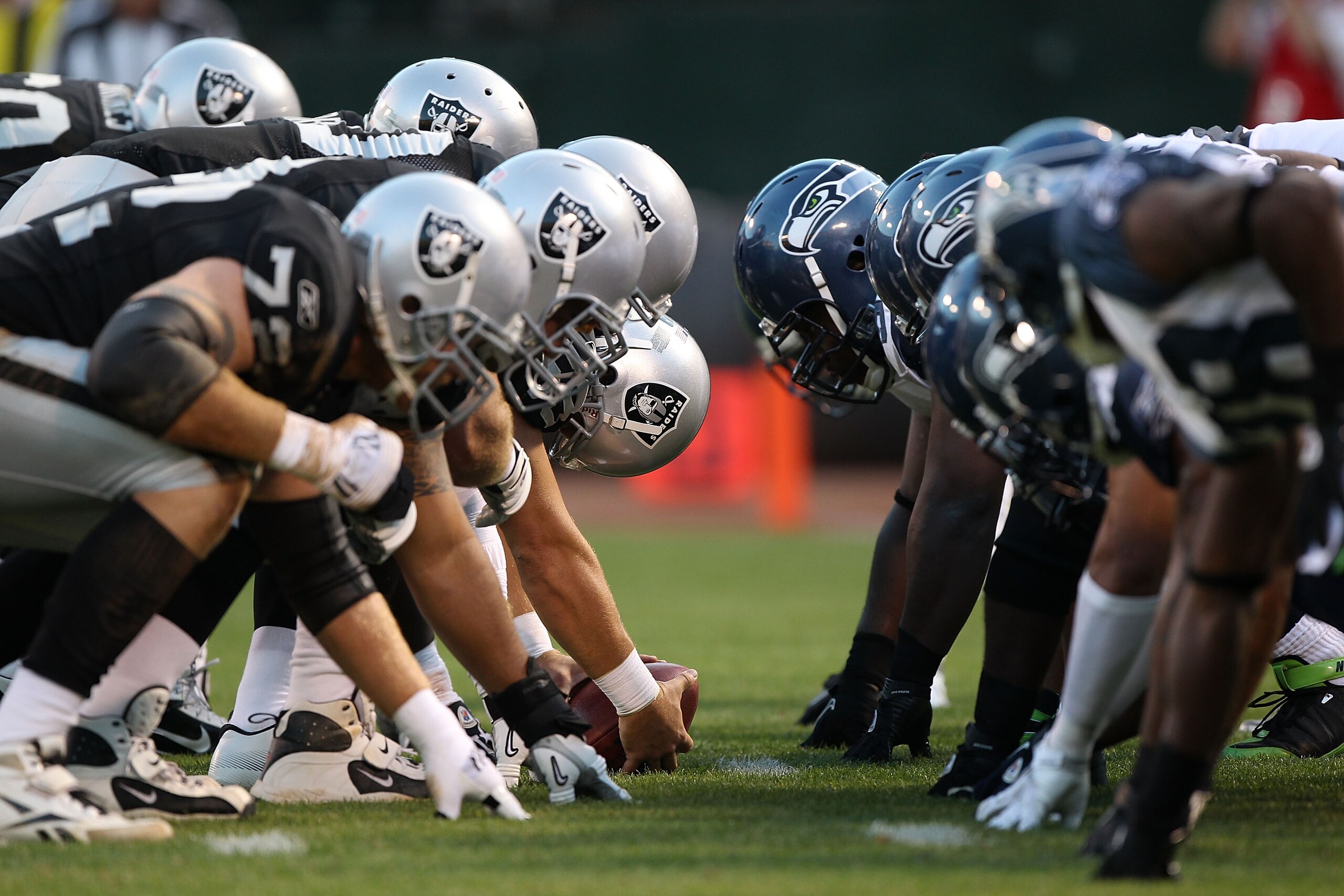 OAKLAND, CA - SEPTEMBER 2:  Members of the Seattle Seahawks line up against the Oakland Raiders during an NFL preseason game at Oakland-Alameda County Coliseum on September 2, 2010 in Oakland, California.  (Photo by Jed Jacobsohn/Getty Images)
