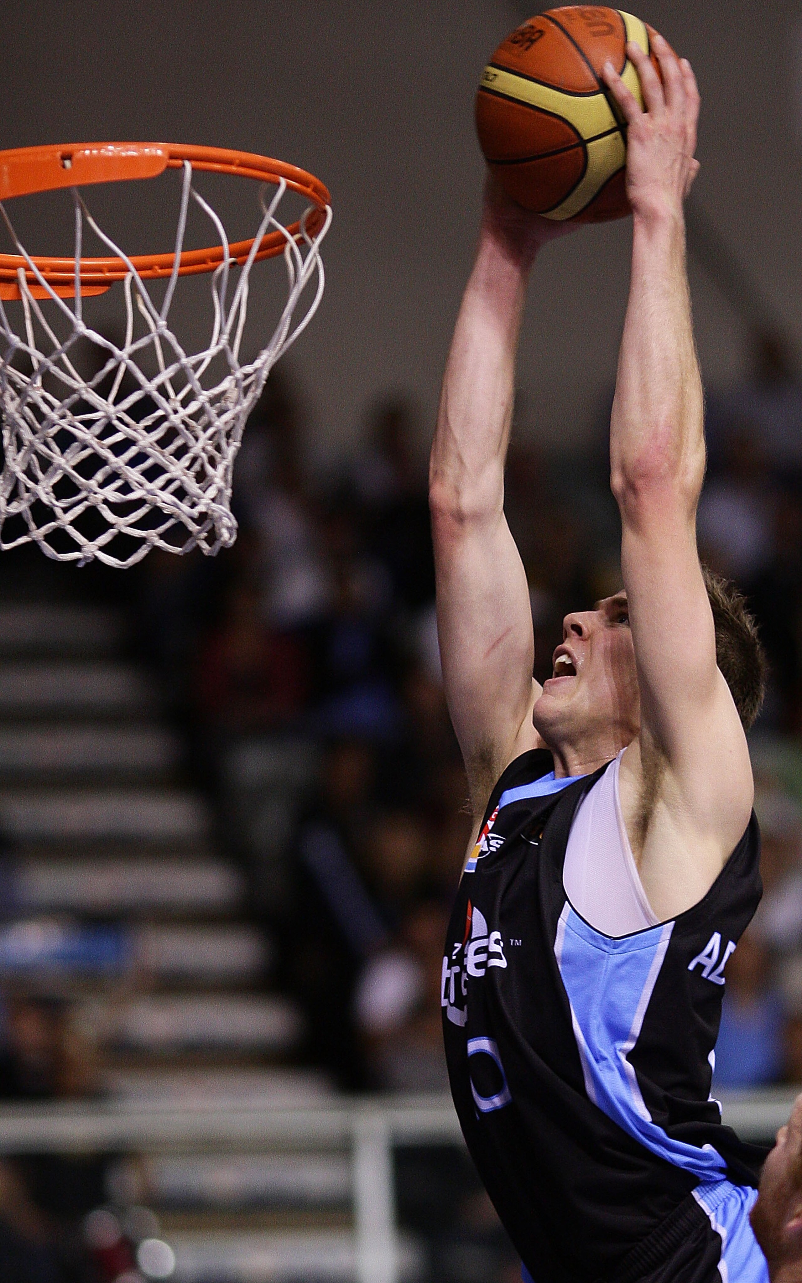 AUCKLAND, NEW ZEALAND - NOVEMBER 12:  Thomas Abercrombie of the Breakers dunks the ball during the round eight NBL match between the New Zealand Breakers and the Perth Wildcats at North Shore Events Centre on November 12, 2009 in Auckland, New Zealand.  (