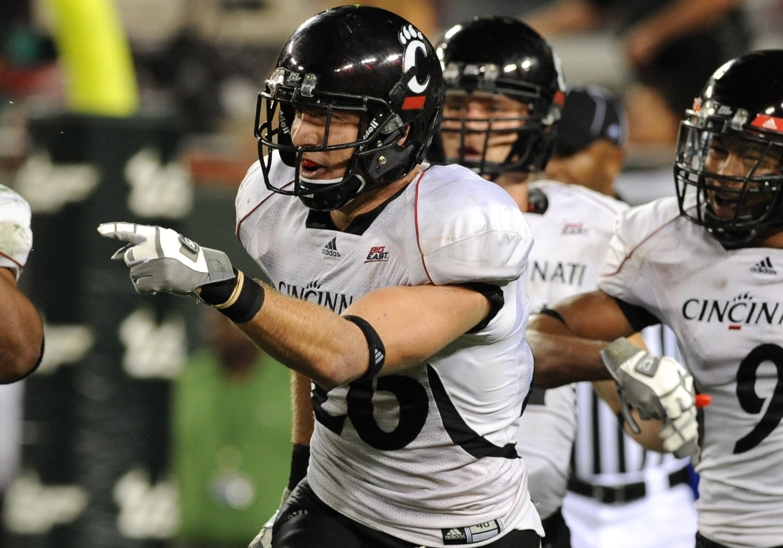 TAMPA, FL - OCTOBER 15:  Safety Drew Frey #26 of the Cincinnati Bearcats celebrates an interception against the University of South Florida Bulls October 15, 2009 at Raymond James Stadium in Tampa, Florida.  (Photo by Al Messerschmidt/Getty Images)