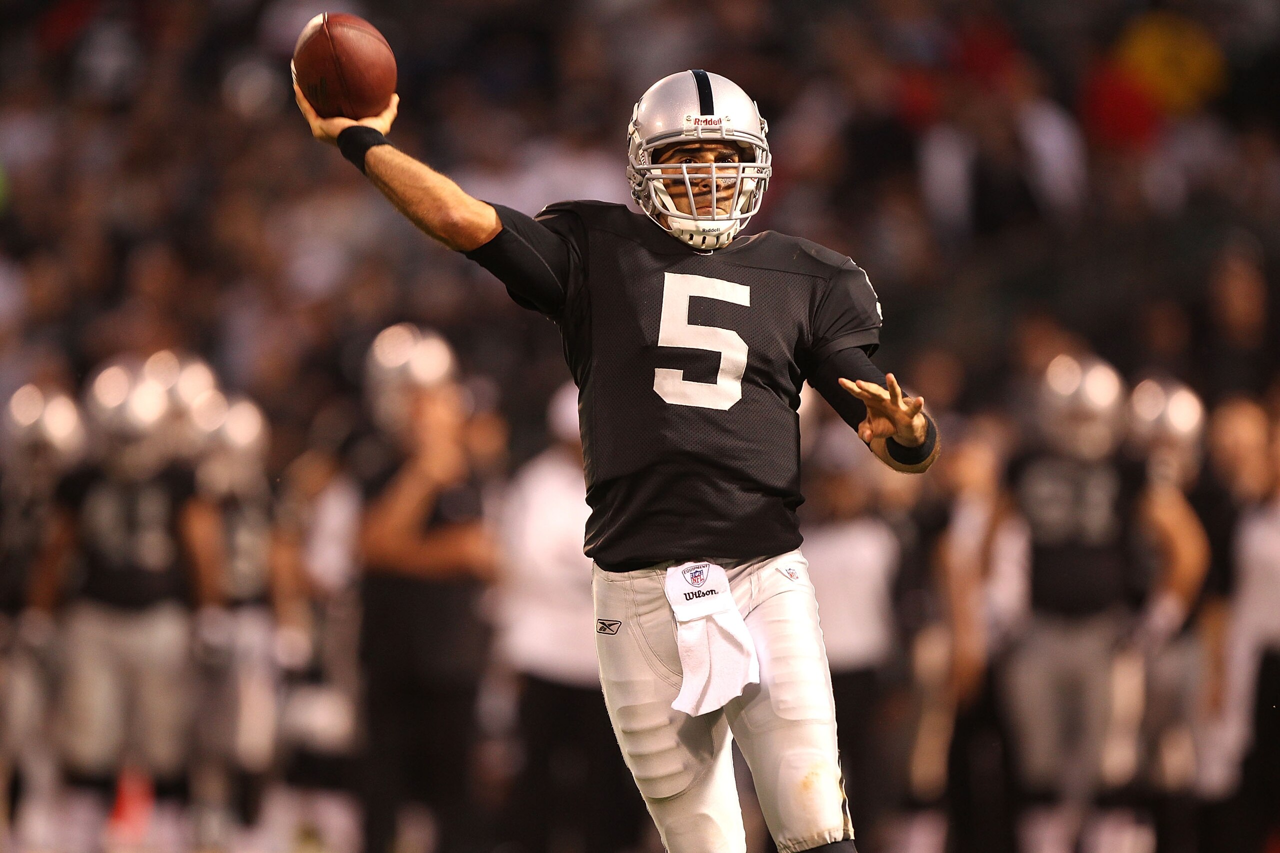 OAKLAND, CA - SEPTEMBER 02:  Bruce Gradkowski #11 of the Oakland Raiders passes against the Seattle Seahawks during an NFL preseason game at Oakland-Alameda County Coliseum on September 2, 2010 in Oakland, California.  (Photo by Jed Jacobsohn/Getty Images
