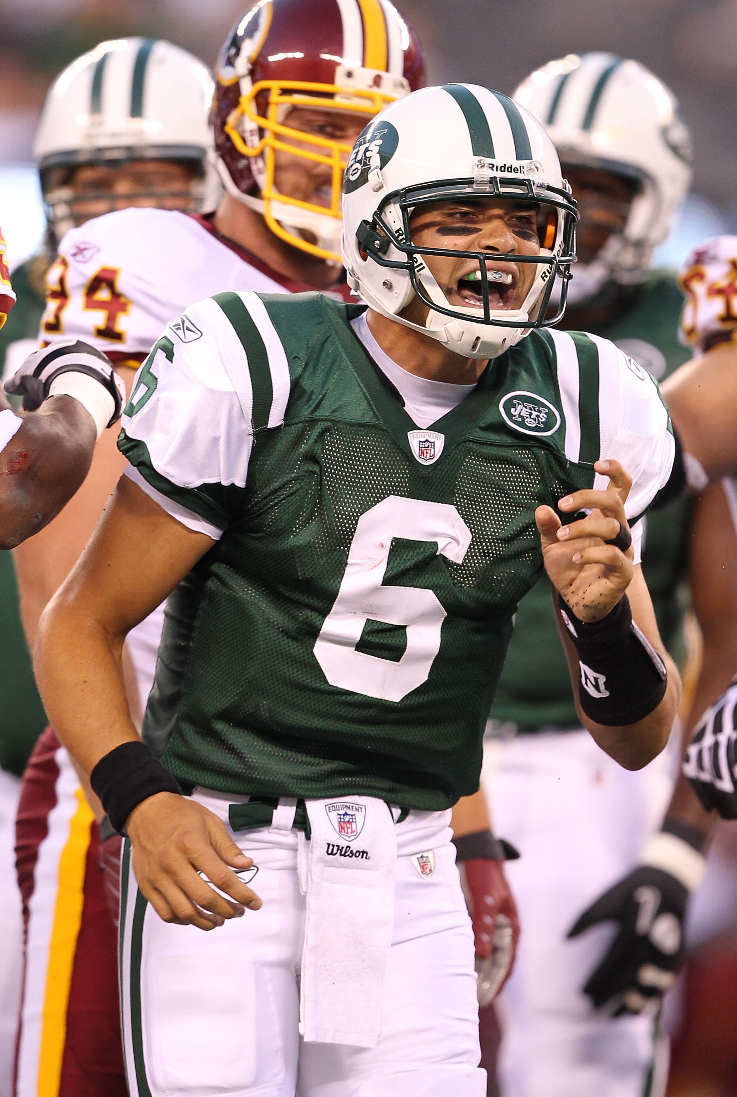 EAST RUTHERFORD, NJ - AUGUST 27:  Mark Sanchez #6 of the New York Jets in action against the Washington Redskins  during their preseason game on August 27, 2010 at the New Meadowlands Stadium  in East Rutherford, New Jersey.  (Photo by Al Bello/Getty Imag