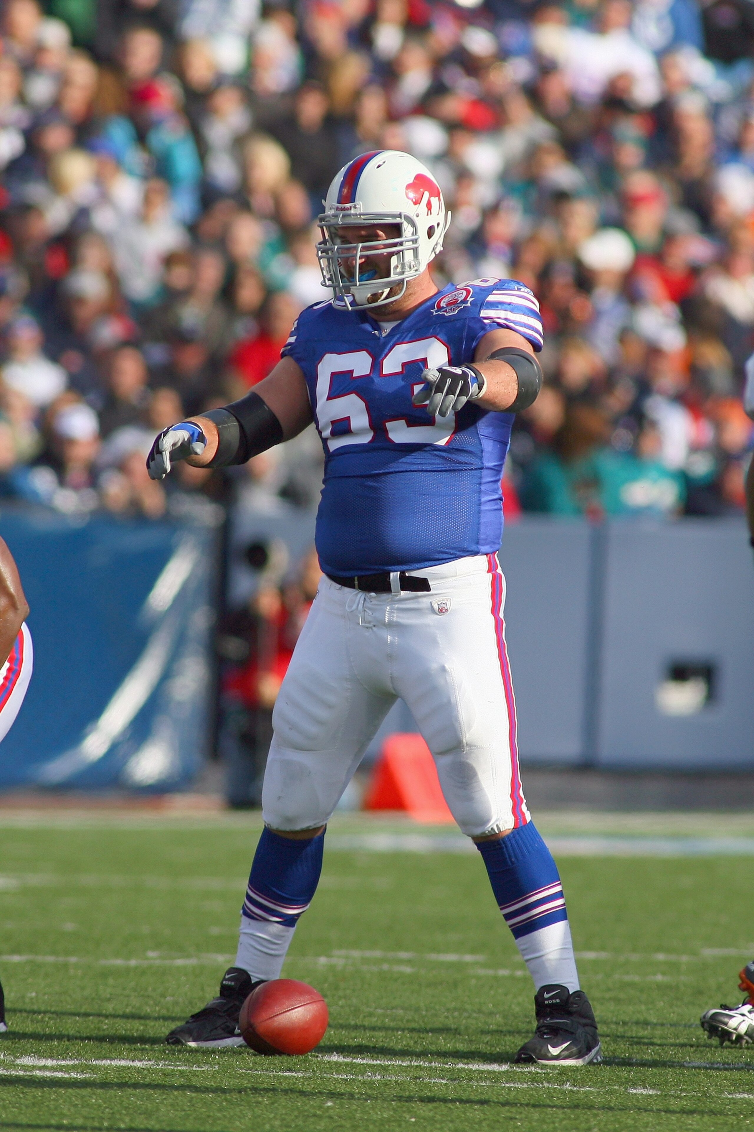 ORCHARD PARK, NY - NOVEMBER 29:  Geoff Hangartner #63 of the Buffalo Bills gets ready on the field during the game against the Miami Dolphins at Ralph Wilson Stadium on November 29, 2009 in Orchard Park, New York. Buffalo won 31-14. (Photo by Rick Stewart