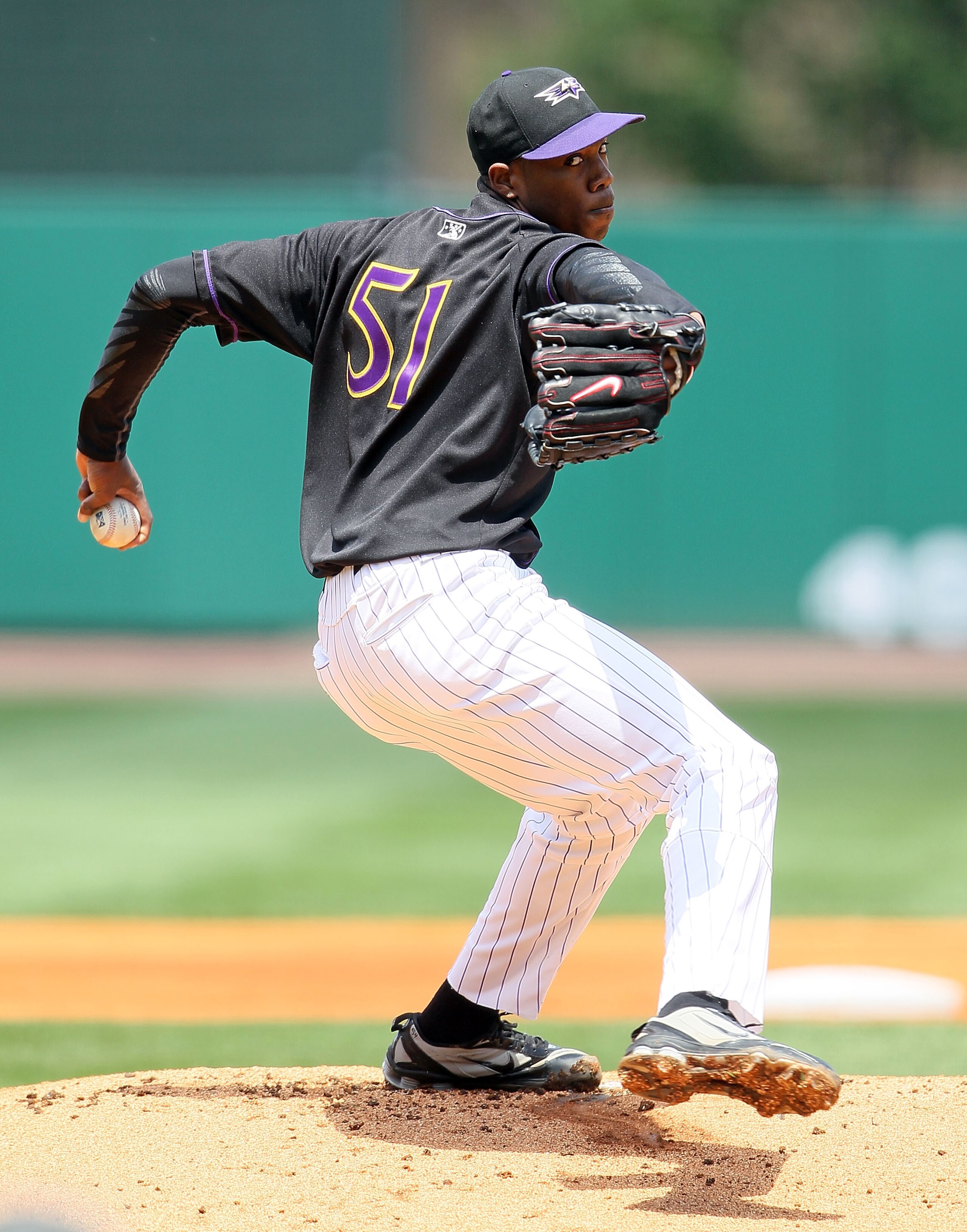 LOUISVILLE, KY - MAY 09:  Oroldis Chapman #51 of the Louisville Bats throws a pitch during the game against the Rochester Red Wings at Louisville Slugger Field on May 9, 2010 in Louisville, Kentucky.  (Photo by Andy Lyons/Getty Images)