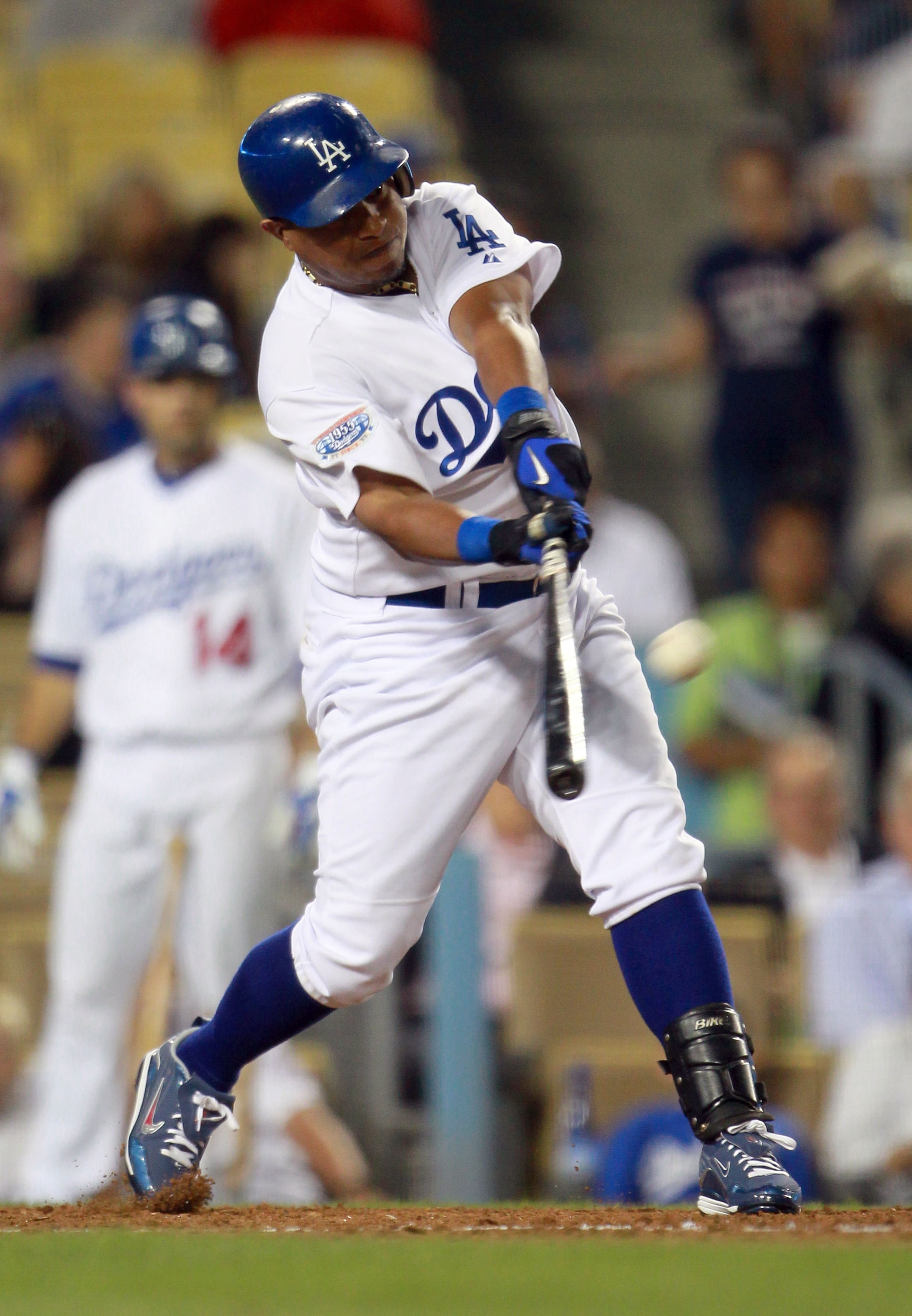 LOS ANGELES, CA - AUGUST 04:  Ronnie Belliard #3 of the Los Angeles Dodgers hits an RBI single in the third inning against the San Diego Padres at Dodger Stadium on August 4, 2010 in Los Angeles, California. (Photo by Jeff Gross/Getty Images)