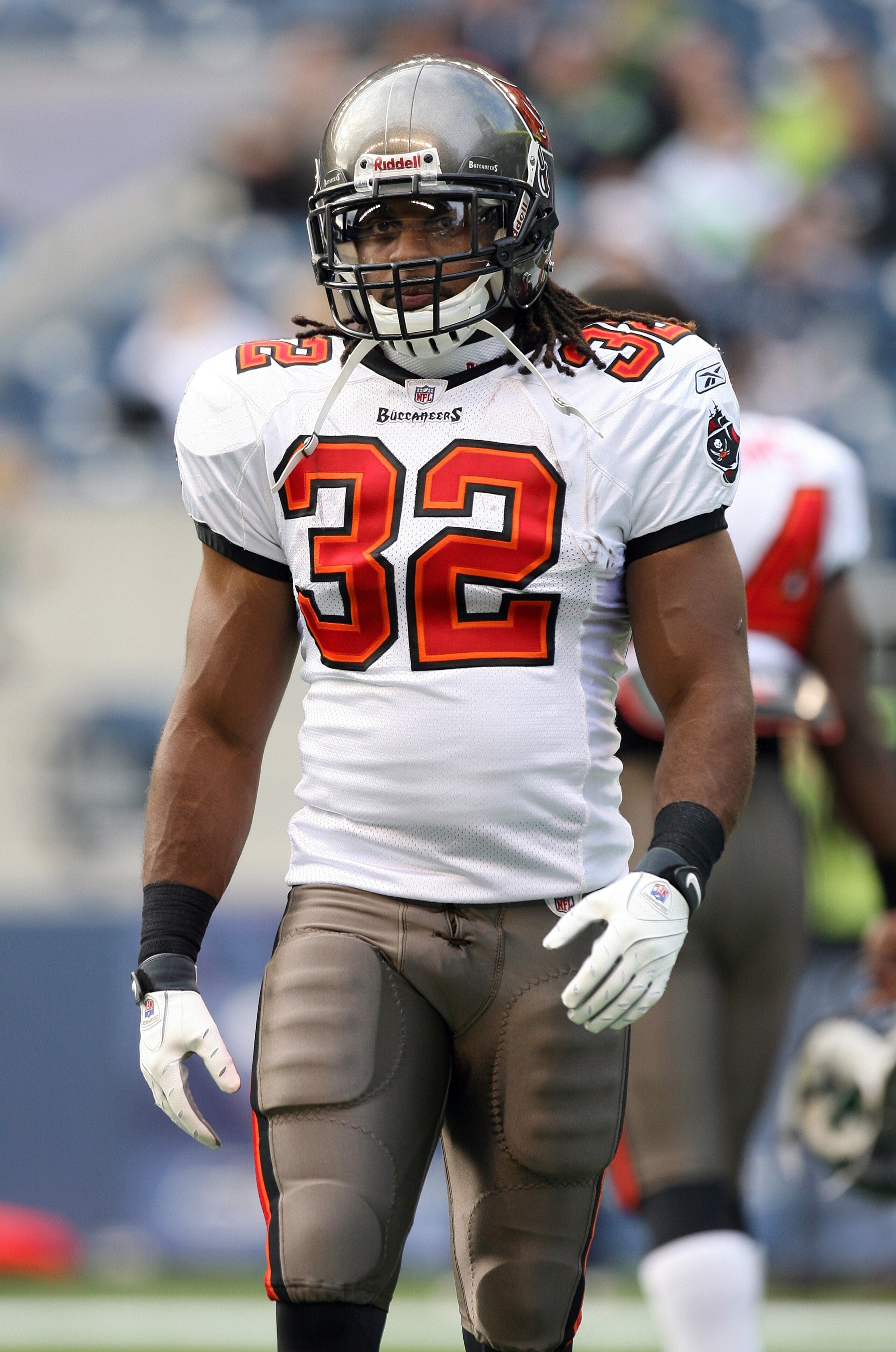 SEATTLE - DECEMBER 20:  Kareem Huggins #32 of the Tampa Bay Buccaneers looks on during warm-up prior to their game against the Seattle Seahawks on December 20, 2009 at Qwest Field in Seattle, Washington. The Buccaneers defeated the Seahawks 24-7. (Photo b
