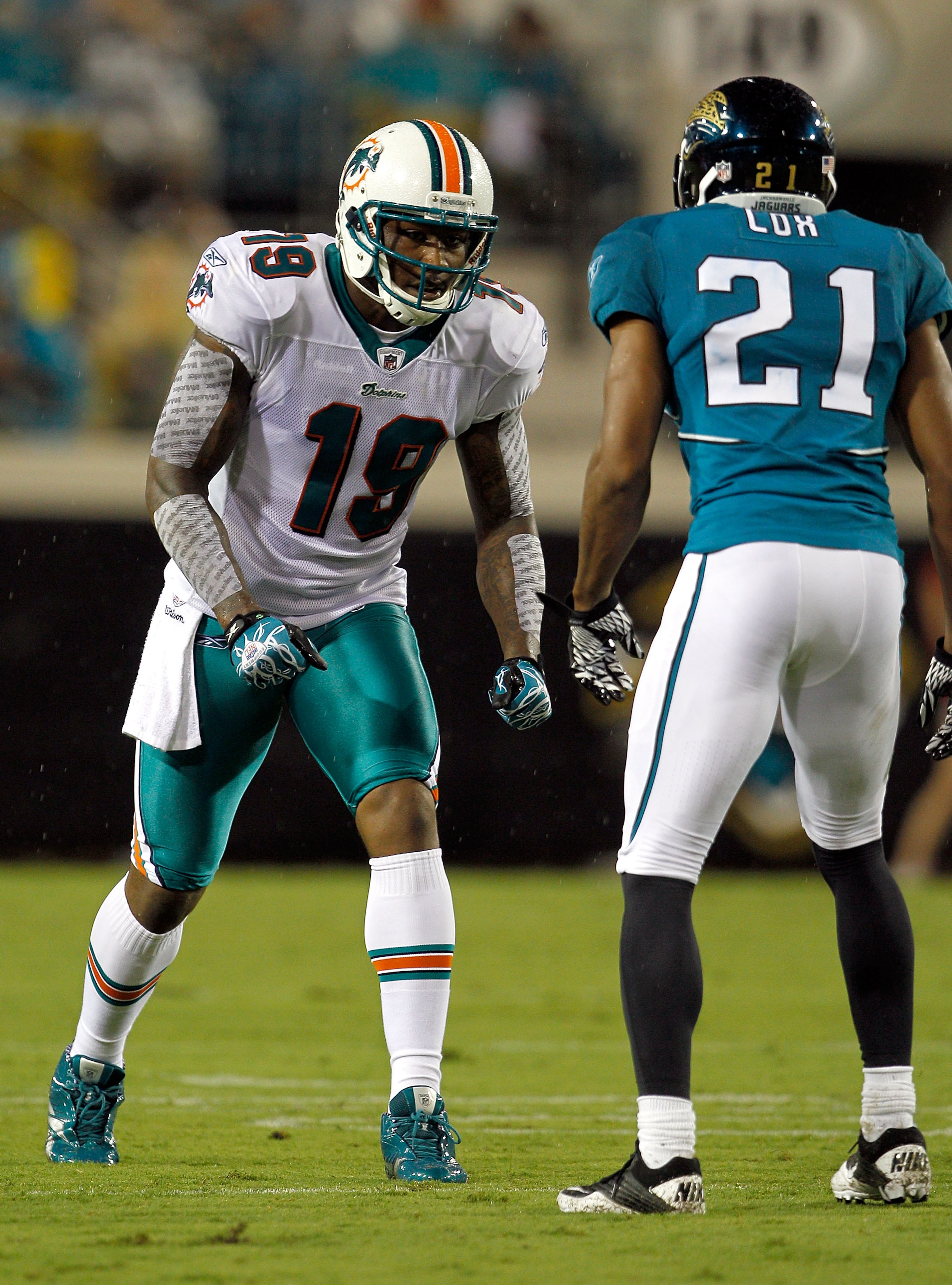 JACKSONVILLE, FL - AUGUST 21:  Brandon Marshall #19 of the Miami Dolphins lines up against Derek Cox #21 of the Jacksonville Jaguars during the preseason game at EverBank Field on August 21, 2010 in Jacksonville, Florida.  (Photo by Sam Greenwood/Getty Im
