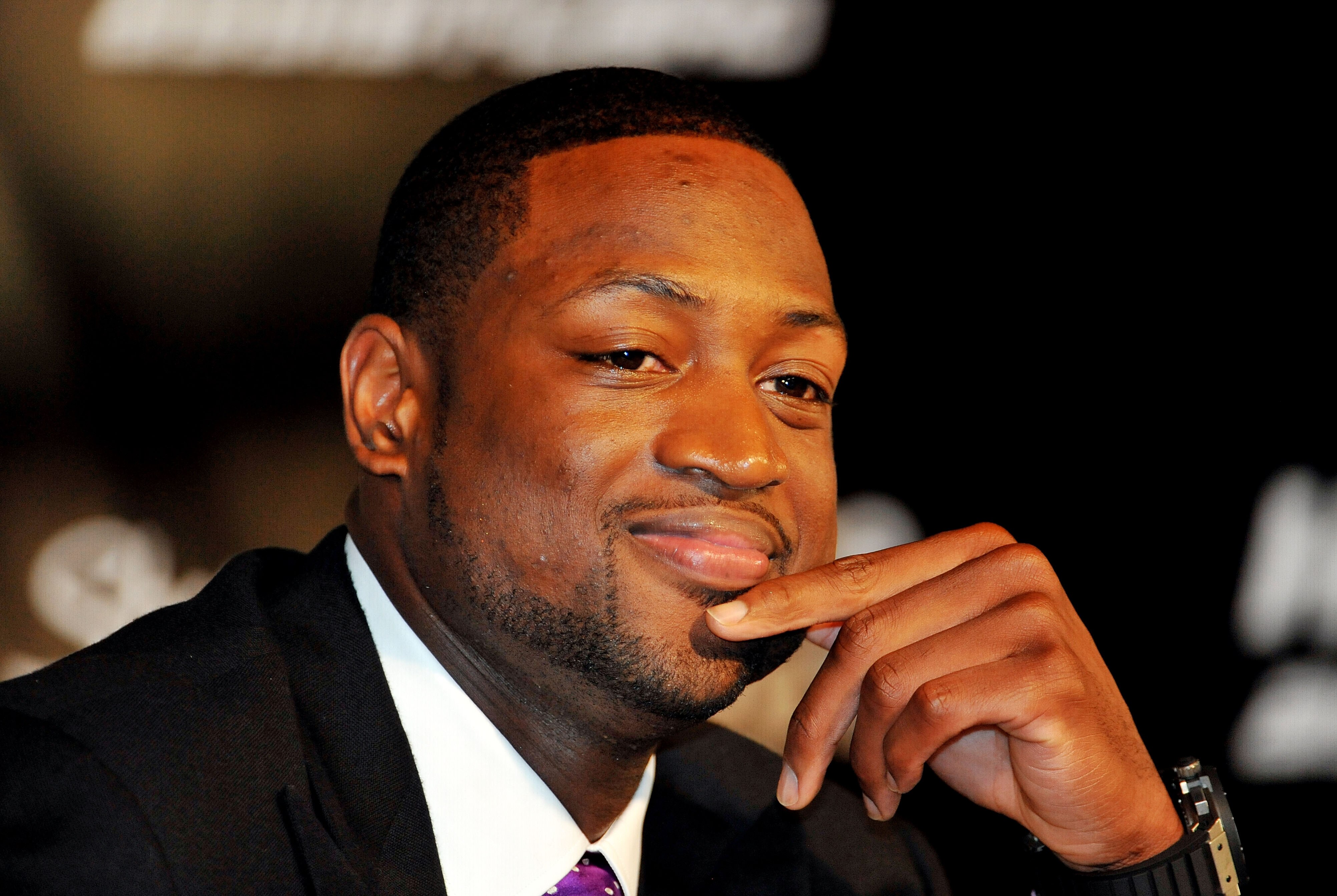 MIAMI - JULY 09:  Dwyane Wade #3 of the Miami Heat talks during a press conference after a welcome party at American Airlines Arena on July 9, 2010 in Miami, Florida.  (Photo by Doug Benc/Getty Images)