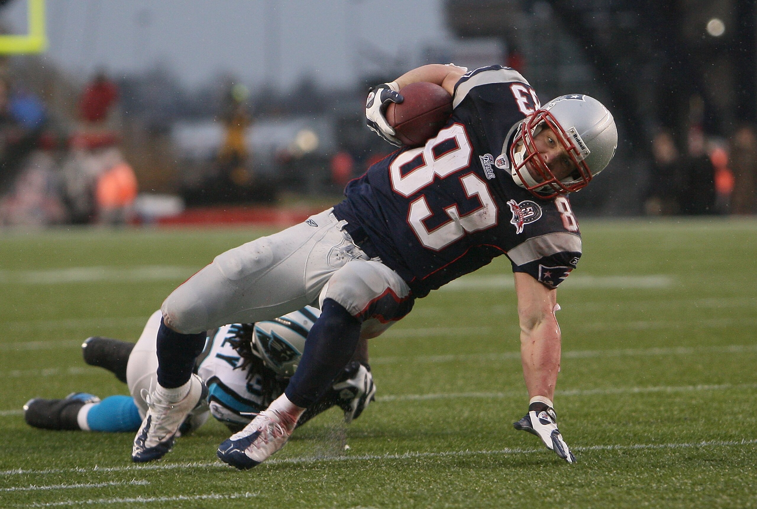 FOXBORO, MA - DECEMBER 13:  Wes Welker #83 of the New England Patriots gains yards against the Carolina Panthers at Gillette Stadium on December 13, 2009 in Foxboro, Massachusetts. The Patriots won 20-10. (Photo by Jim Rogash/Getty Images)