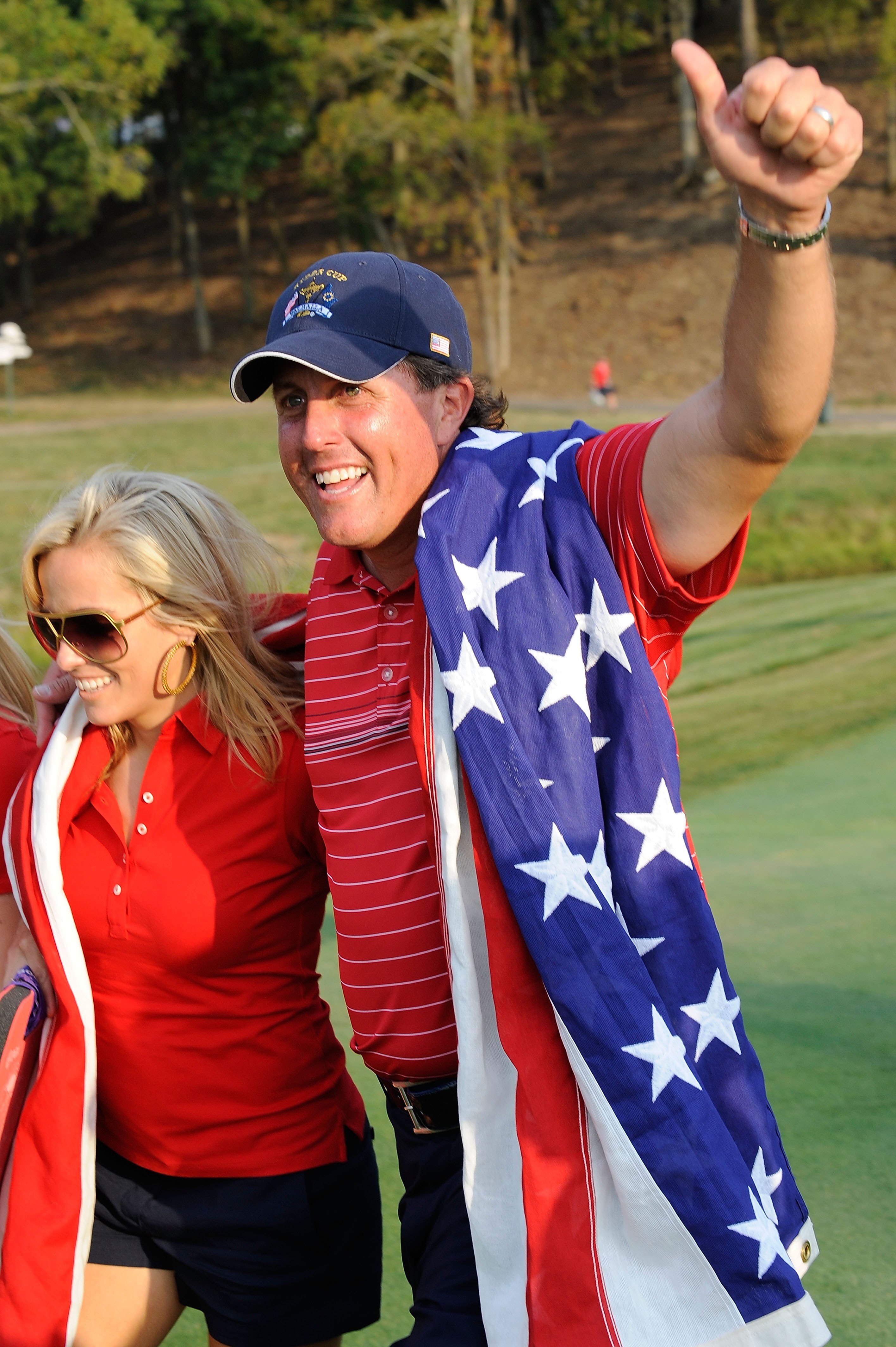 LOUISVILLE, KY - SEPTEMBER 21:  Phil Mickelson of the USA team celebrates with his wife Amy after the USA 16 1/2 - 11 1/2 victory on the final day of the 2008 Ryder Cup at Valhalla Golf Club on September 21, 2008 in Louisville, Kentucky.  (Photo by Sam Gr