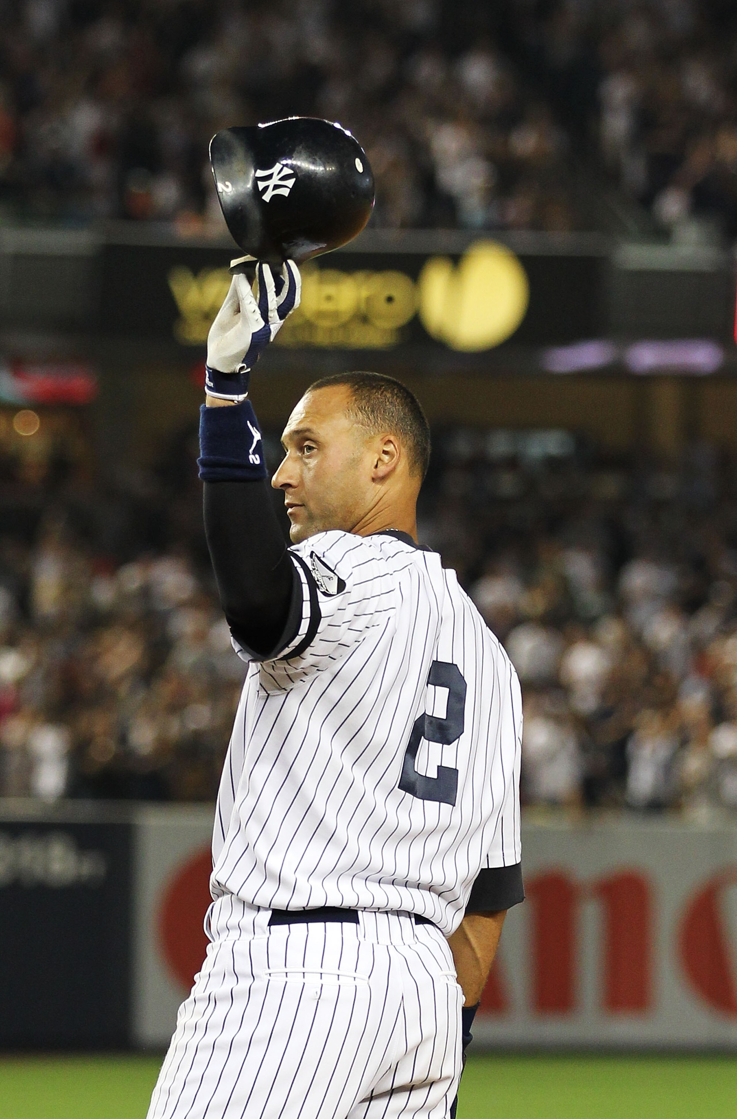 NEW YORK - AUGUST 08:  Derek Jeter #2 of the New York Yankees surpasses Babe Ruth in all time hits with 2874 against  the Boston Red Sox in the second inning against the Boston Red Sox on August 8, 2010 at Yankee Stadium in the Bronx borough of New York C