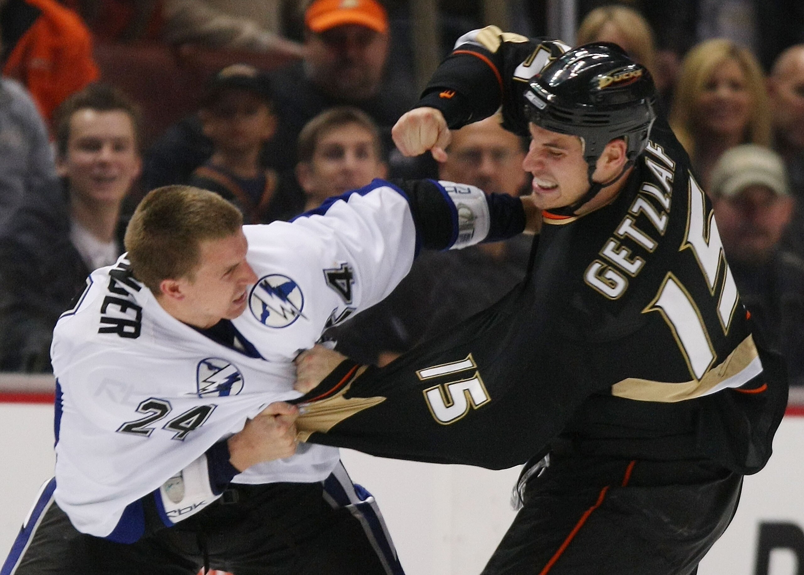 ANAHEIM, CA - JANUARY 09: Matt Pettinger #24 of the Tampa Bay Lightning fights with Ryan Getzlaf #15 of the Anaheim Ducks on January 9, 2009 at the Honda Center in Anaheim, California. (Photo by Bruce Bennett/Getty Images)