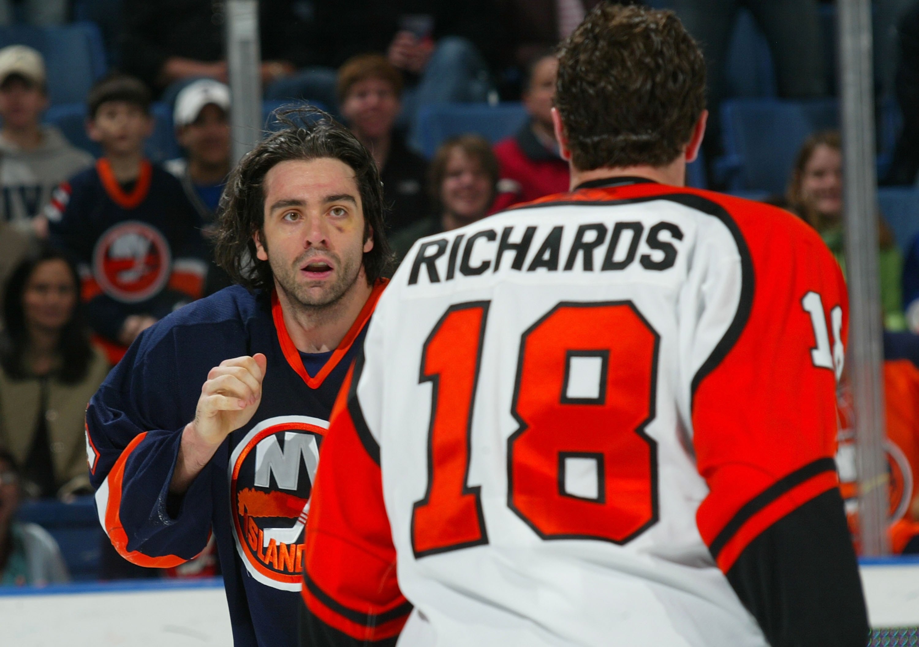 UNIONDALE, NY - APRIL 2:  Joel Bouchard #4 of the New York Islanders prepares to fight Mike Richards #18 of the Philadelphia Flyerson April 2, 2006 at the Nassau Coliseum in Uniondale, New York.  (Photo by Bruce Bennett/Getty Images)