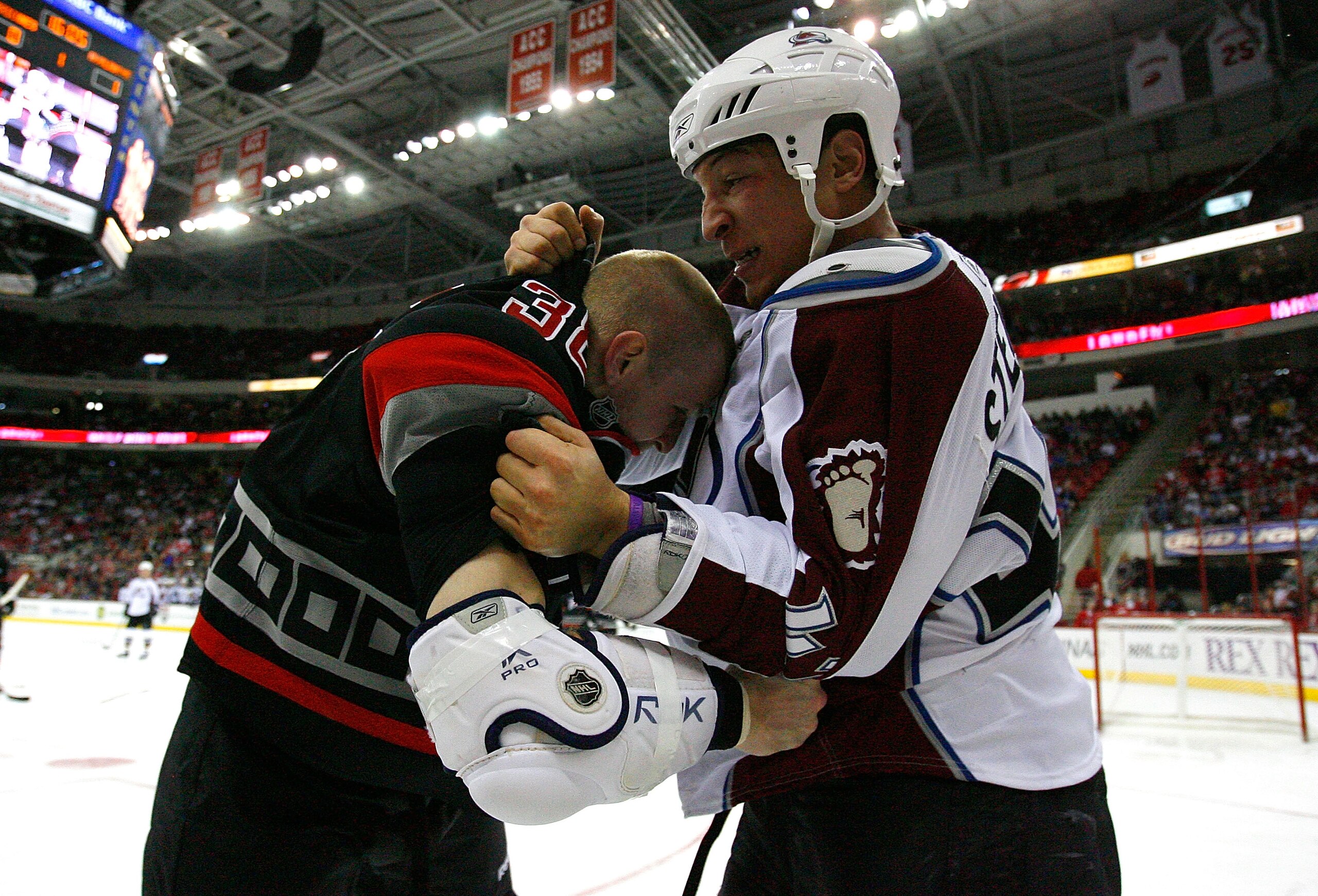 RALEIGH, NC - FEBRUARY 22:  Chris Stewart #42 of the Colorado Avalanche fights with Tim Conboy #38 of the Carolina Hurricanes during the game on February 22, 2009 at RBC Center in Raleigh, North Carolina.  (Photo by Kevin C. Cox/Getty Images)
