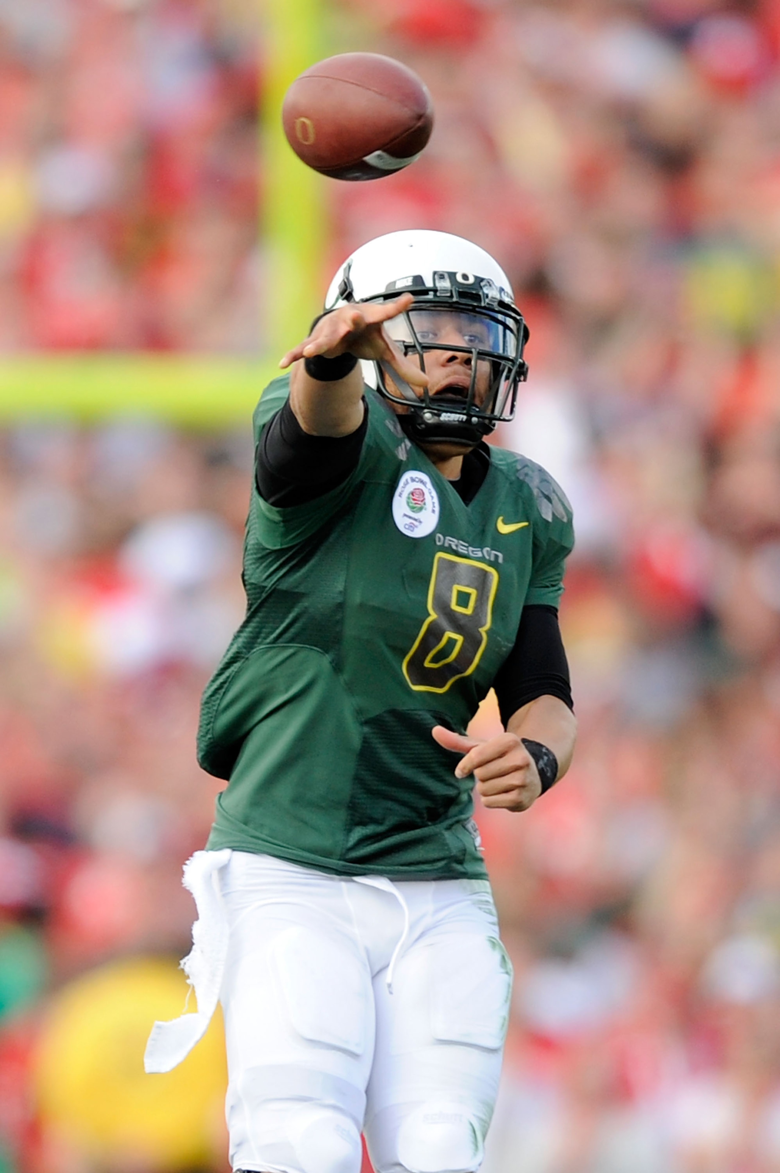 PASADENA, CA - JANUARY 01:  Quarterback Jeremiah Masoli #8 of the Oregon Ducks attempts a pass against the Ohio State Buckeyes at the 96th Rose Bowl game on January 1, 2010 in Pasadena, California.  (Photo by Kevork Djansezian/Getty Images)